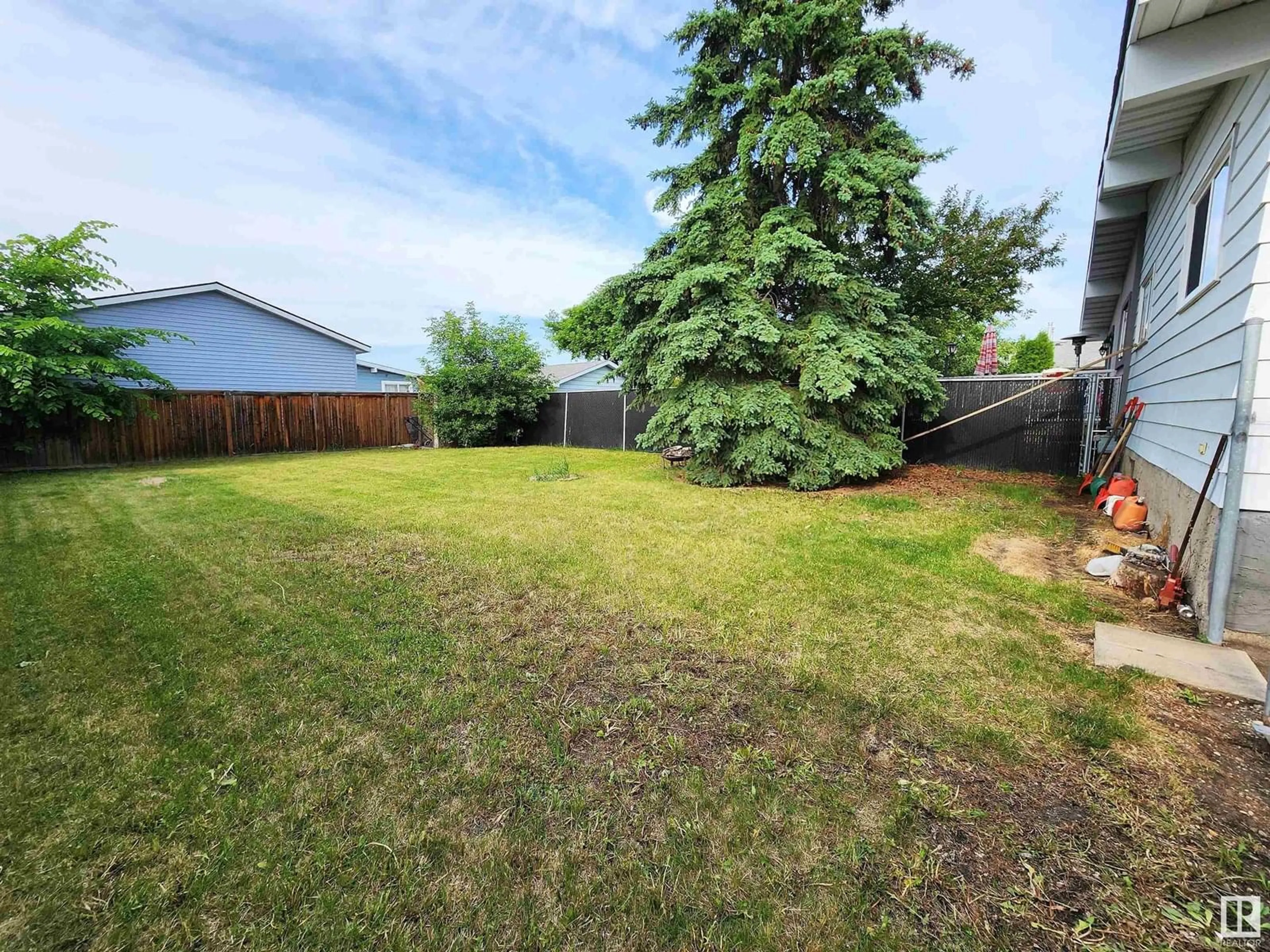 A pic from outside/outdoor area/front of a property/back of a property/a pic from drone, unknown for NW - 3014 132 AV, Edmonton Alberta T5A2Z1