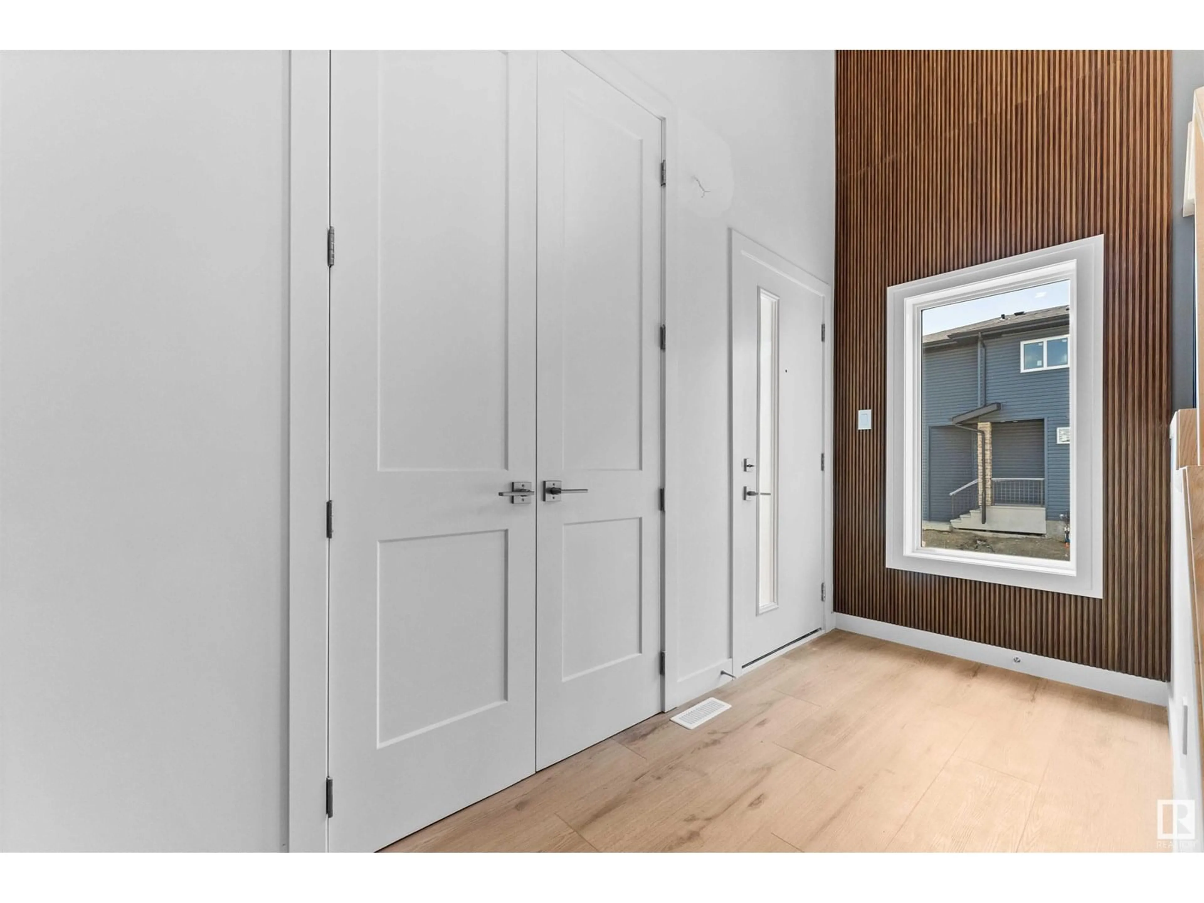 Indoor entryway for NW - 1814 155 AV, Edmonton Alberta T5Y4H8