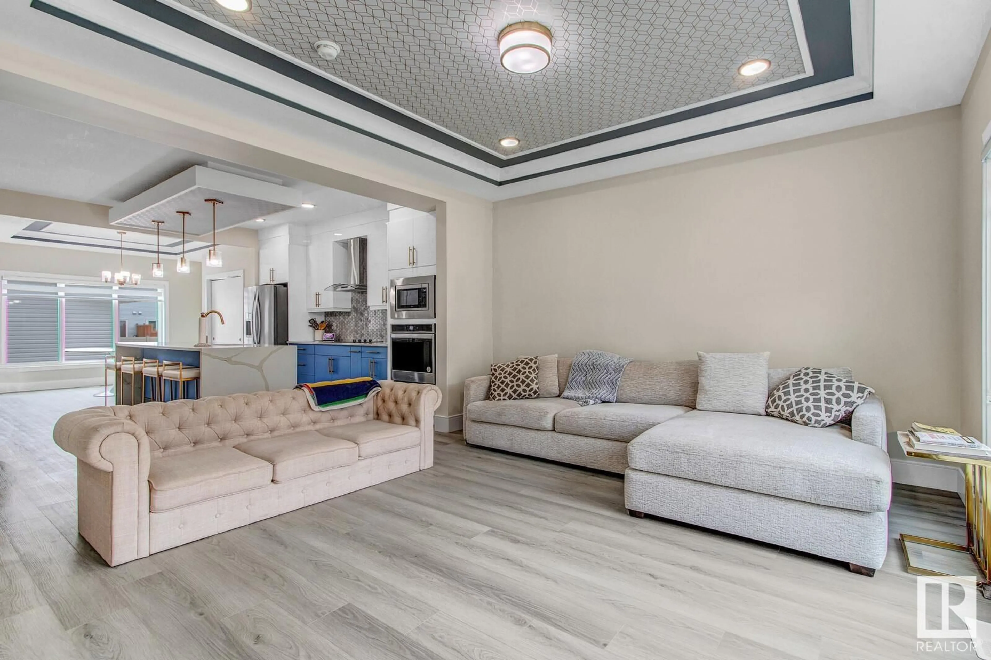 Living room with furniture, ceramic/tile floor for NW - 1727 26A ST, Edmonton Alberta T6T2H9