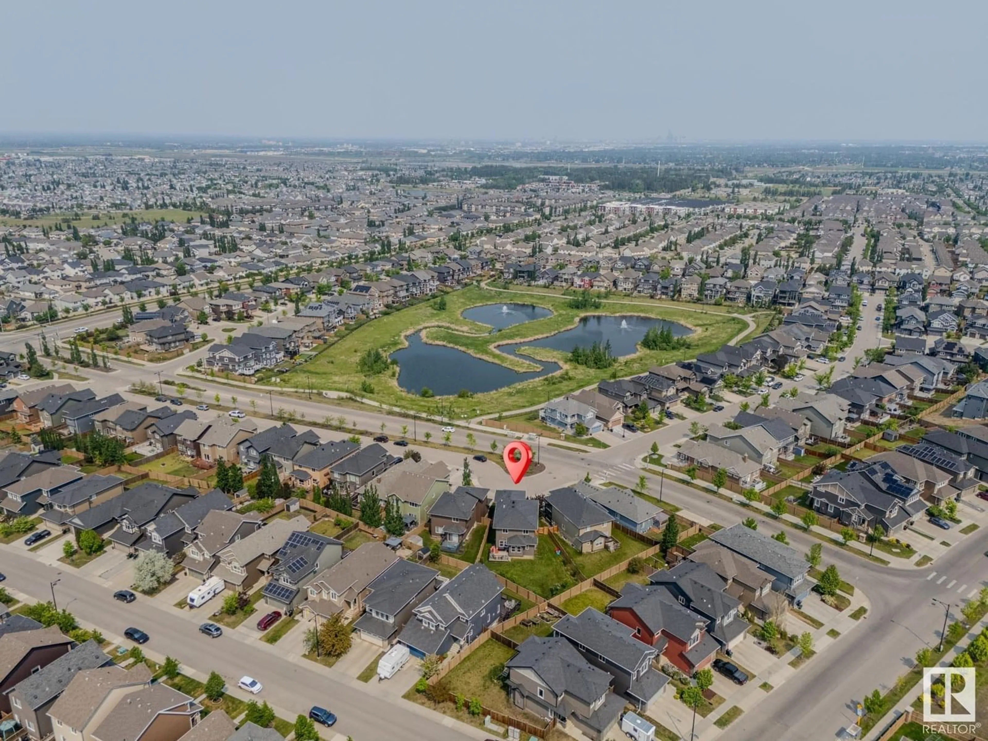 A pic from outside/outdoor area/front of a property/back of a property/a pic from drone, water/lake/river/ocean view for SW - 3015 WINSPEAR CM, Edmonton Alberta T6X1P4