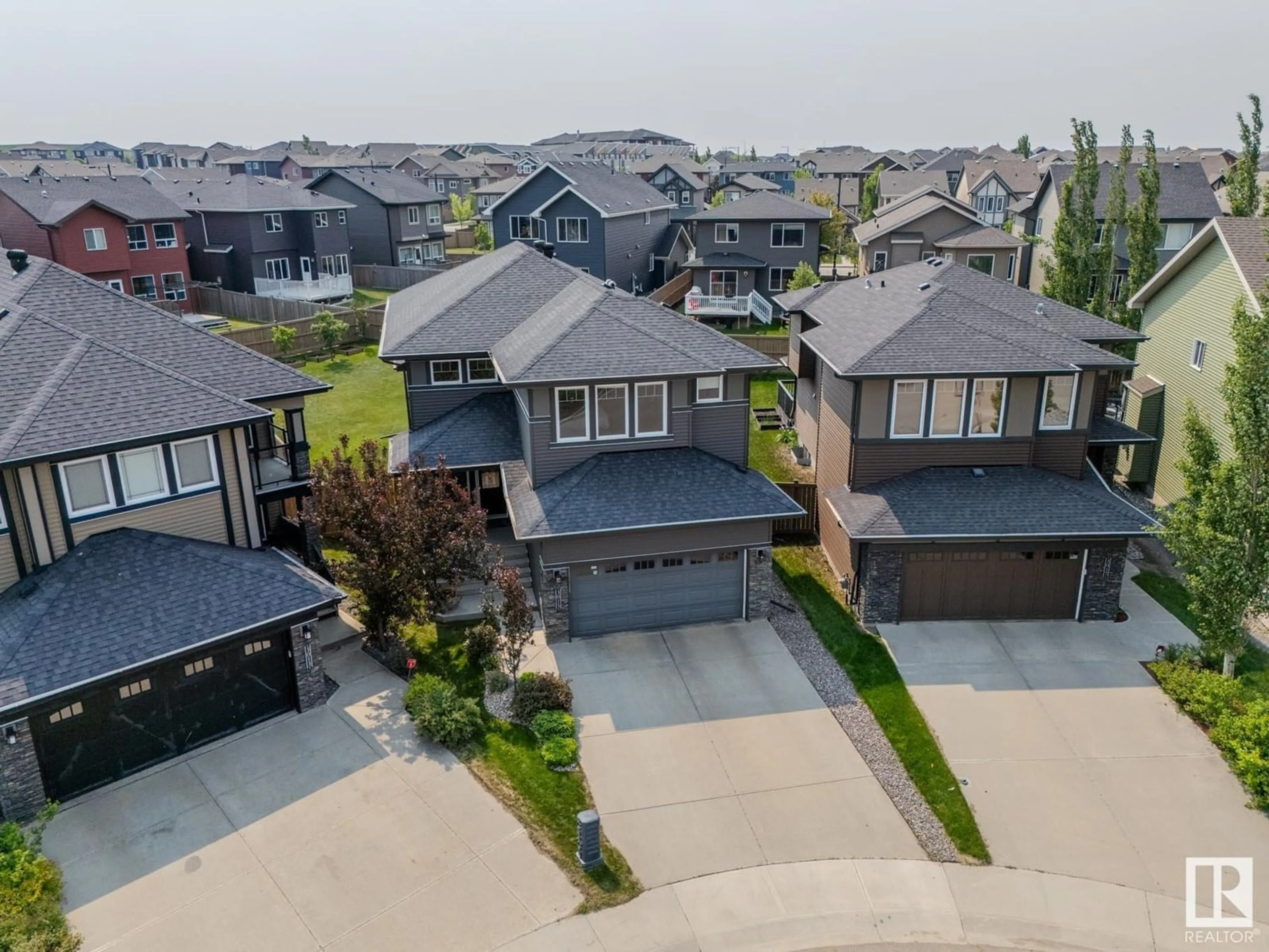 A pic from outside/outdoor area/front of a property/back of a property/a pic from drone, street for SW - 3015 WINSPEAR CM, Edmonton Alberta T6X1P4