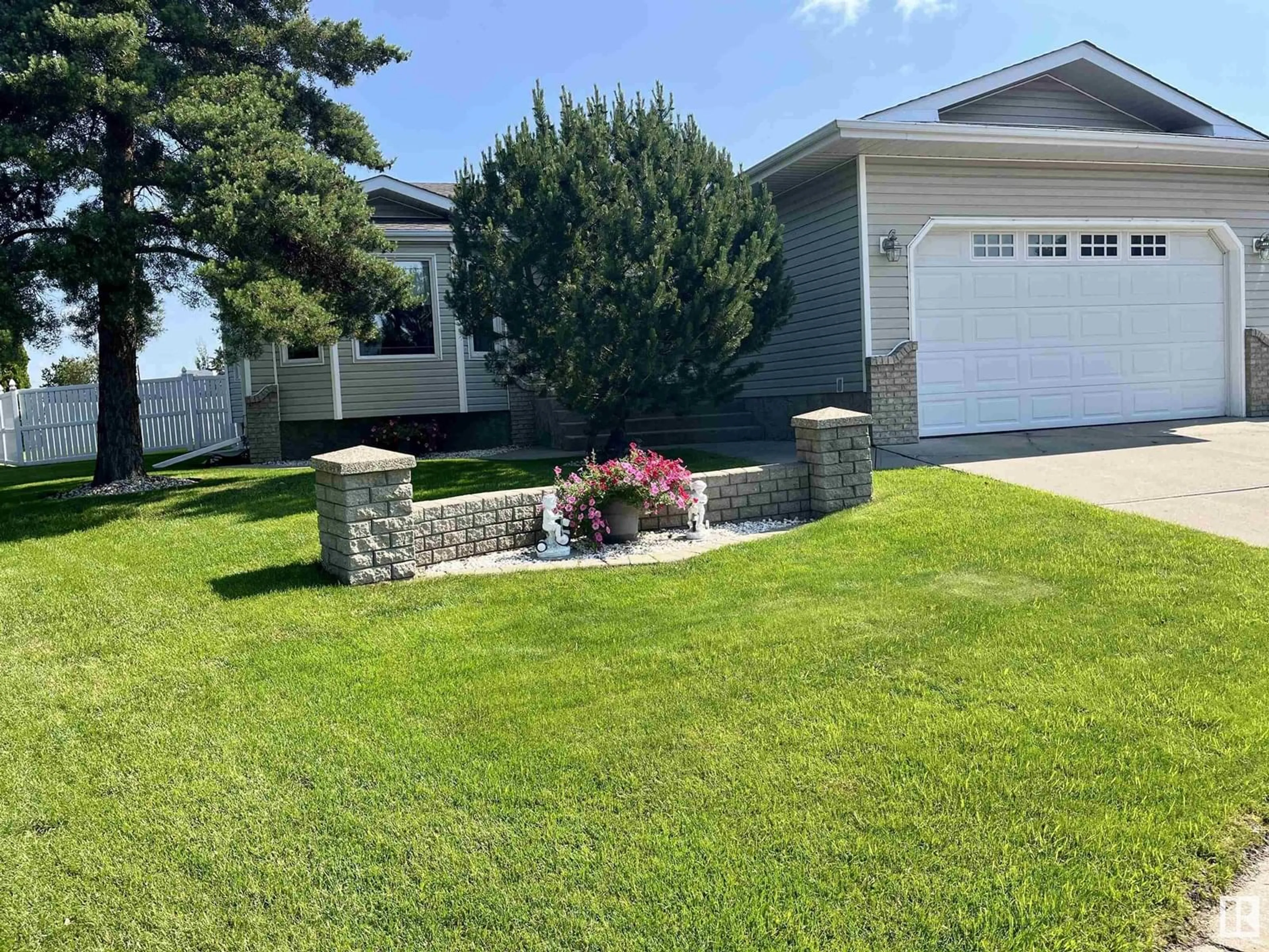 Home with vinyl exterior material, street for 5741 43A ST, Vegreville Alberta T9C1E3