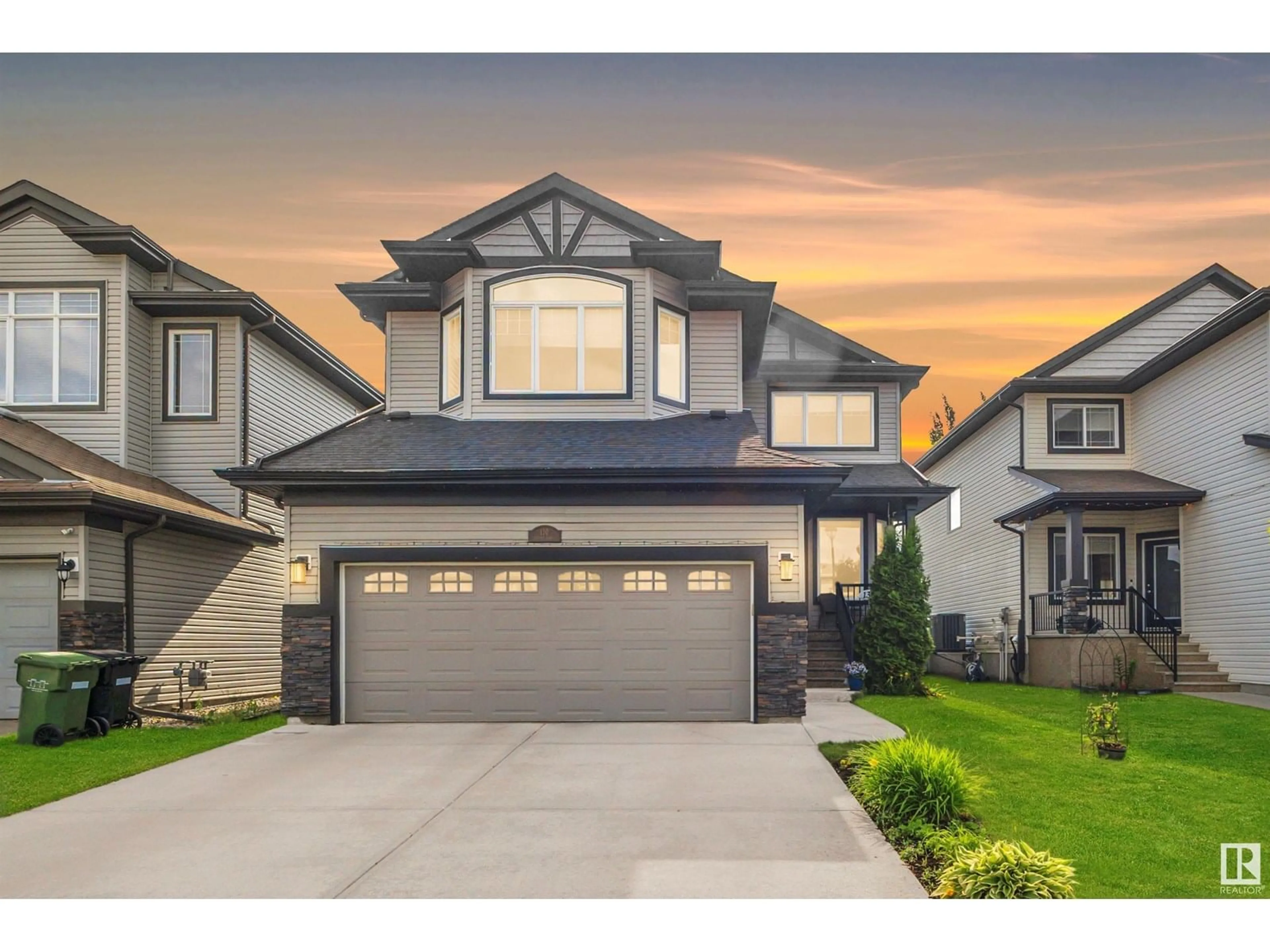 Home with vinyl exterior material, street for 130 KEYPORT CI, Leduc Alberta T9E0M4