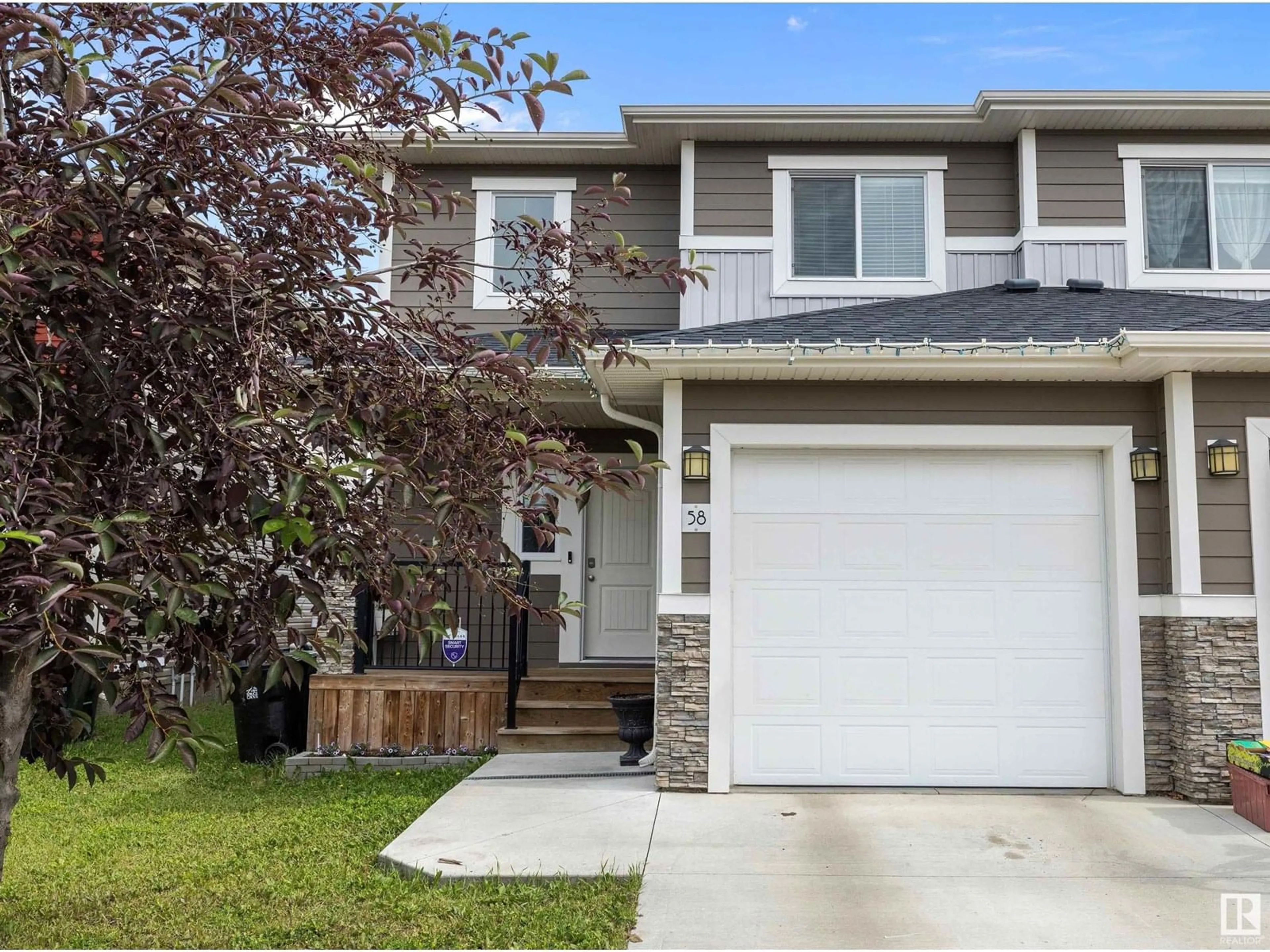 Home with vinyl exterior material, street for 58 HAZELWOOD LN, Spruce Grove Alberta T7X0R7
