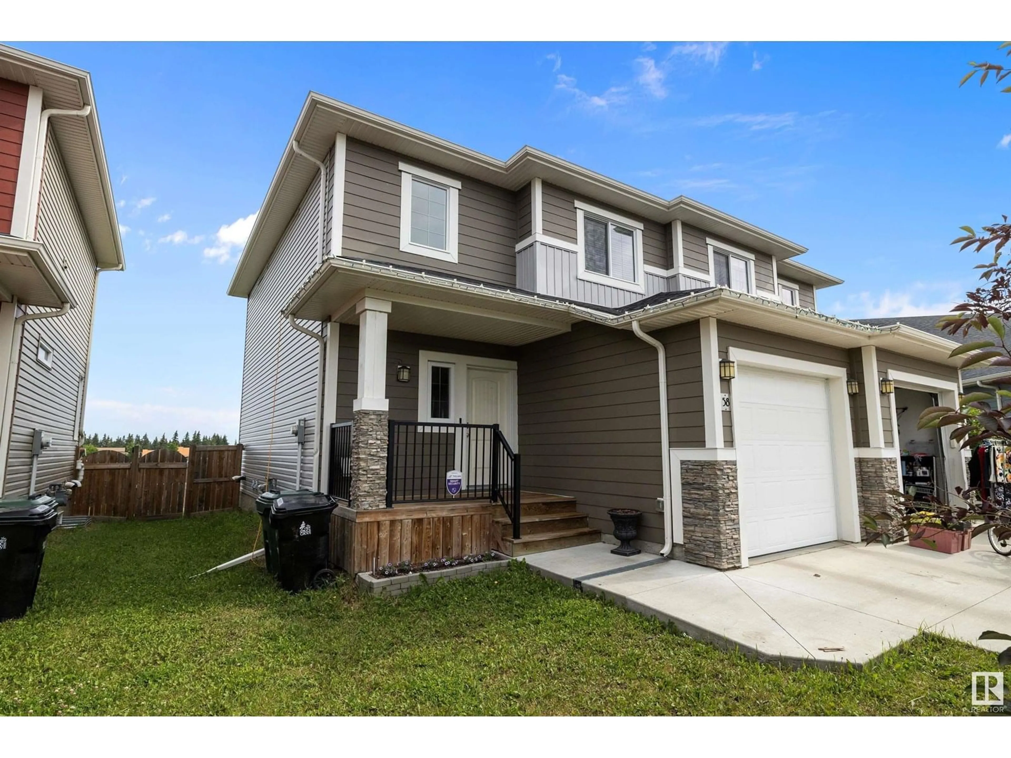 Home with vinyl exterior material, street for 58 HAZELWOOD LN, Spruce Grove Alberta T7X0R7