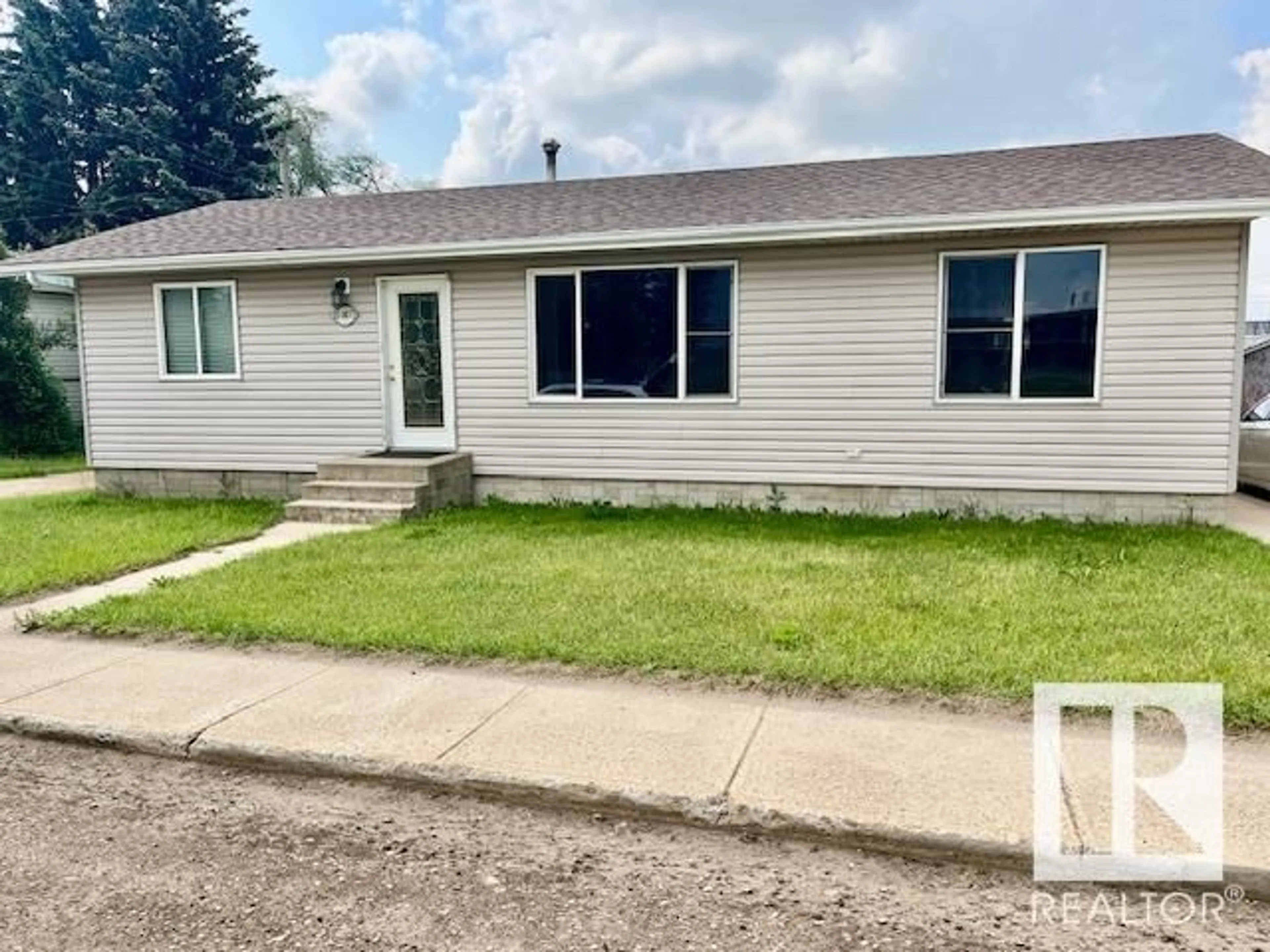 Home with vinyl exterior material, street for 5007 54 AVE, Two Hills Alberta T0B4K0