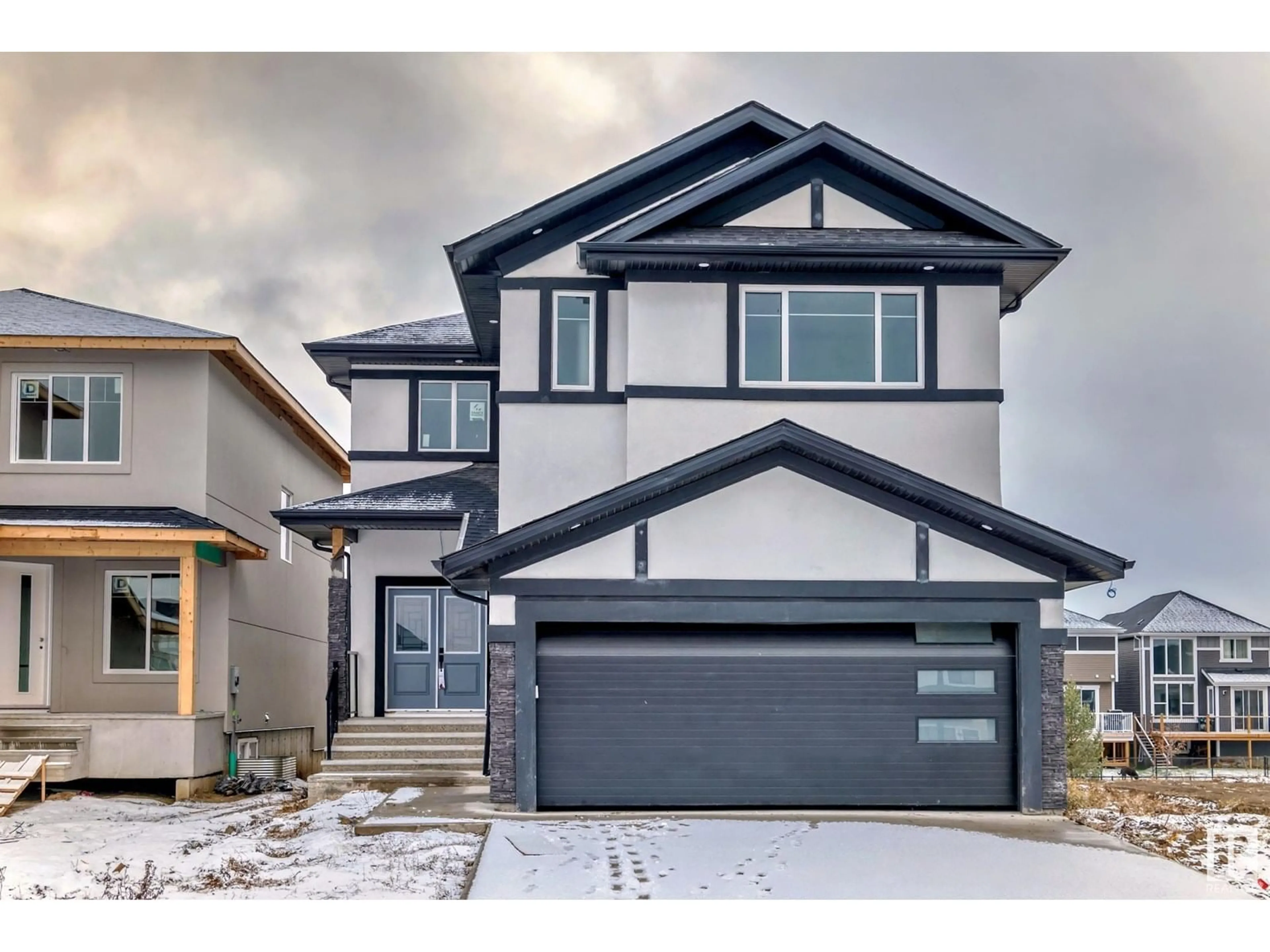Home with vinyl exterior material, street for 128 EDGEWATER CI, Leduc Alberta T9E1K5
