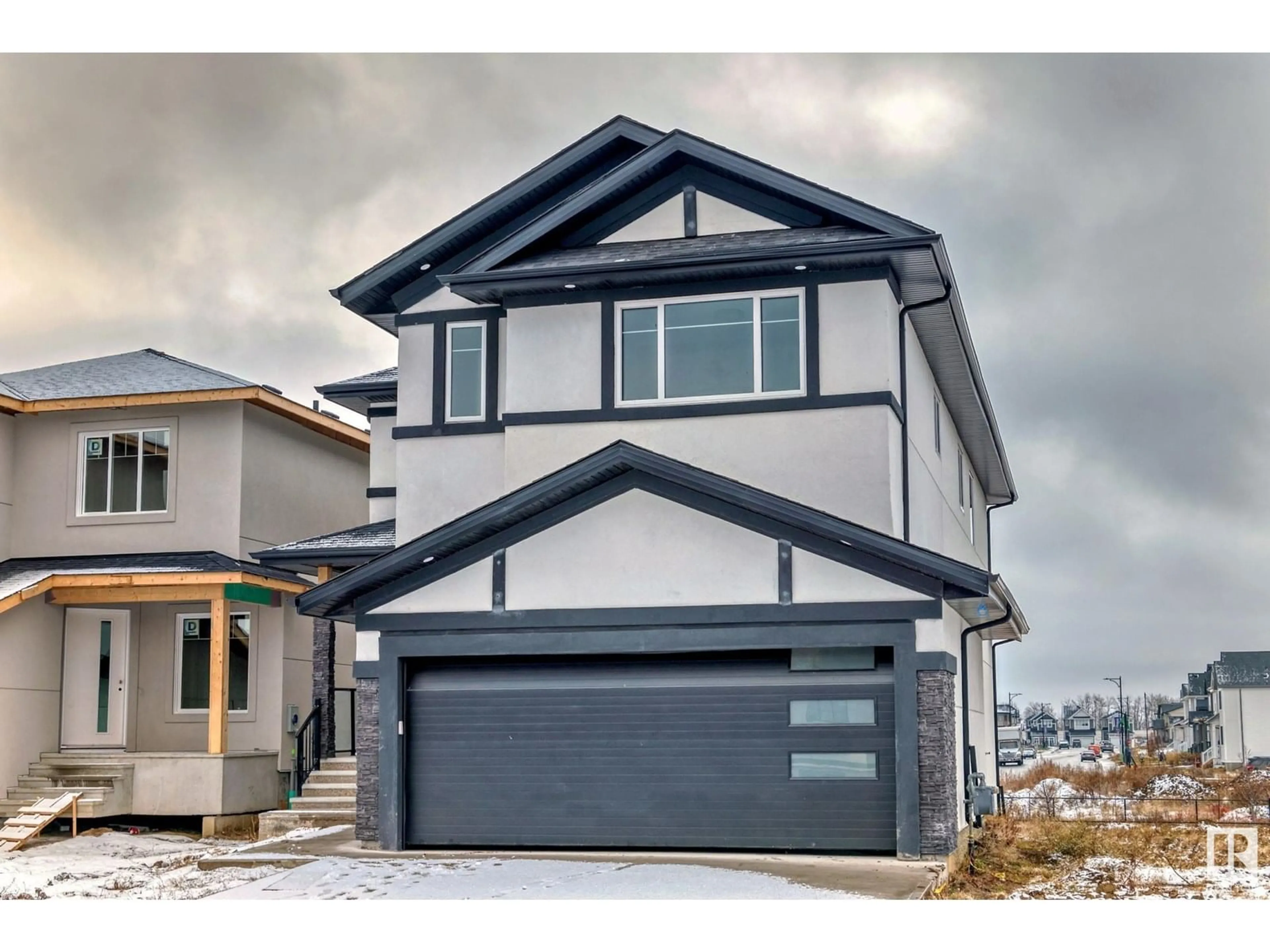 Home with vinyl exterior material, street for 128 EDGEWATER CI, Leduc Alberta T9E1K5