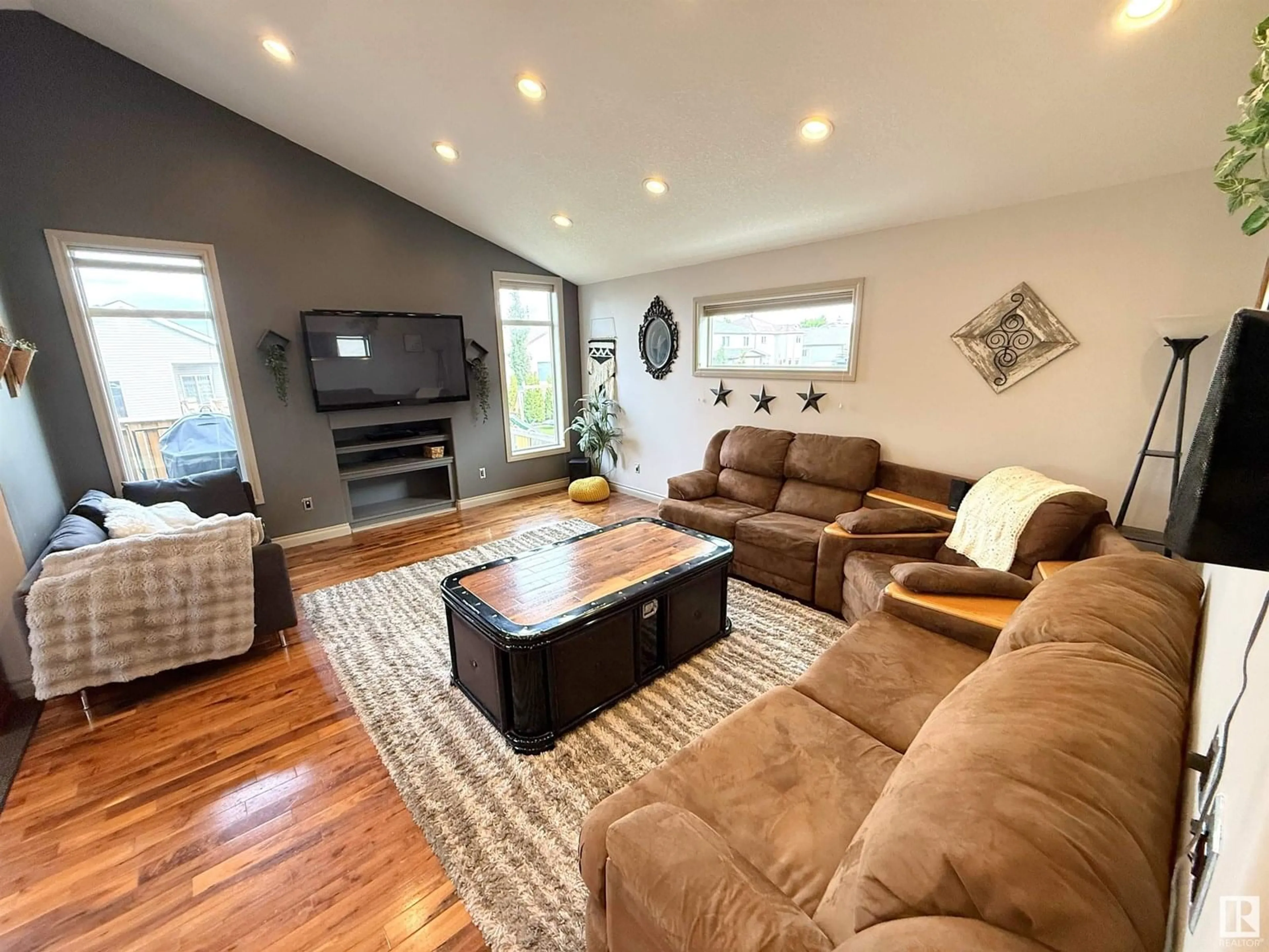 Living room with furniture, wood/laminate floor for 78 LAMPLIGHT DR, Spruce Grove Alberta T7X0G8