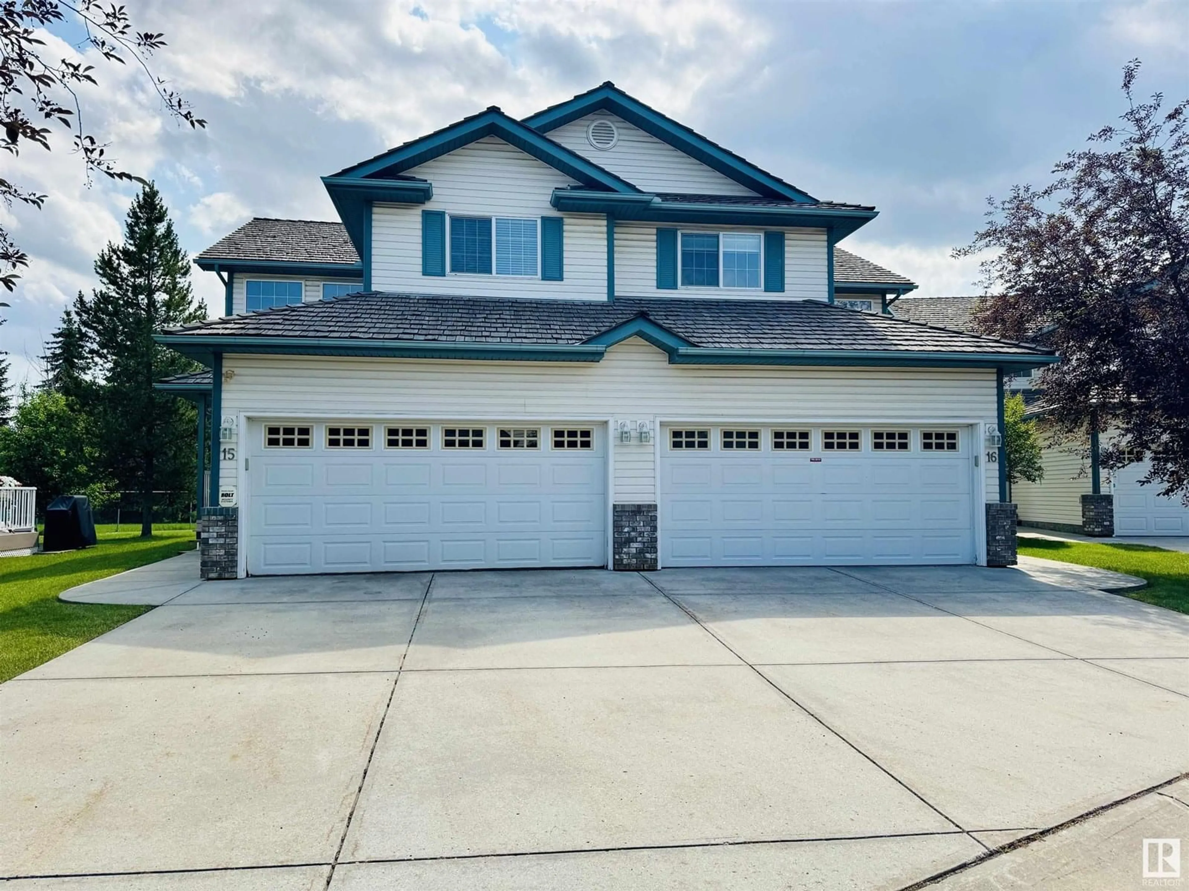 Home with vinyl exterior material, street for 15 - 211 BLACKBURN DR, Edmonton Alberta T6W1C8