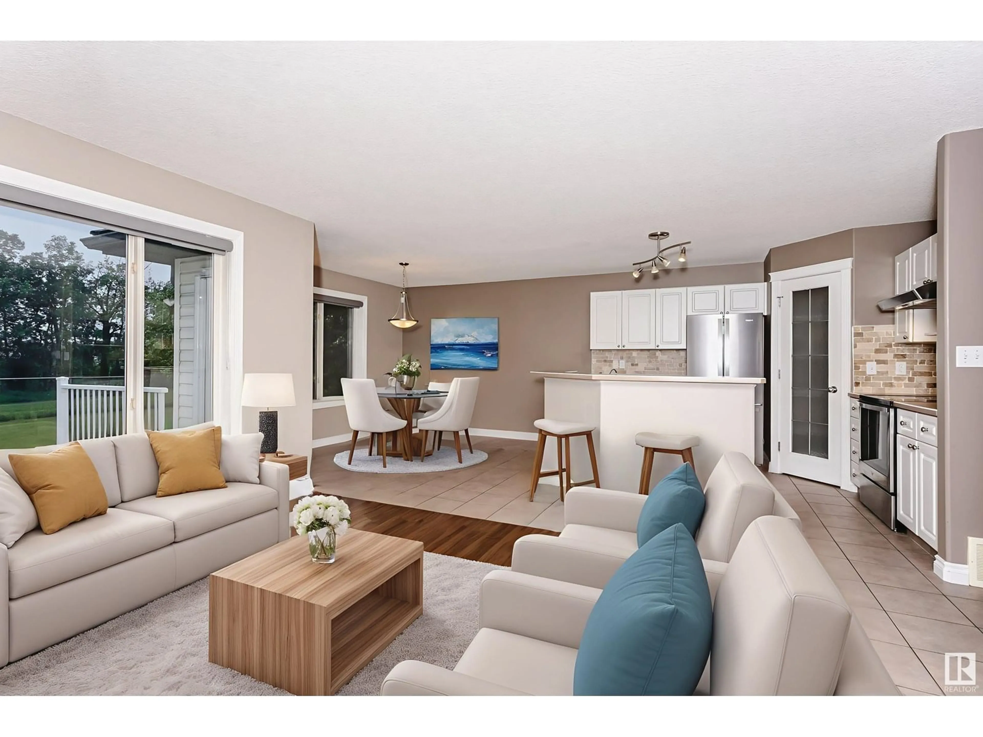 Living room with furniture, wood/laminate floor for 15 - 211 BLACKBURN DR, Edmonton Alberta T6W1C8