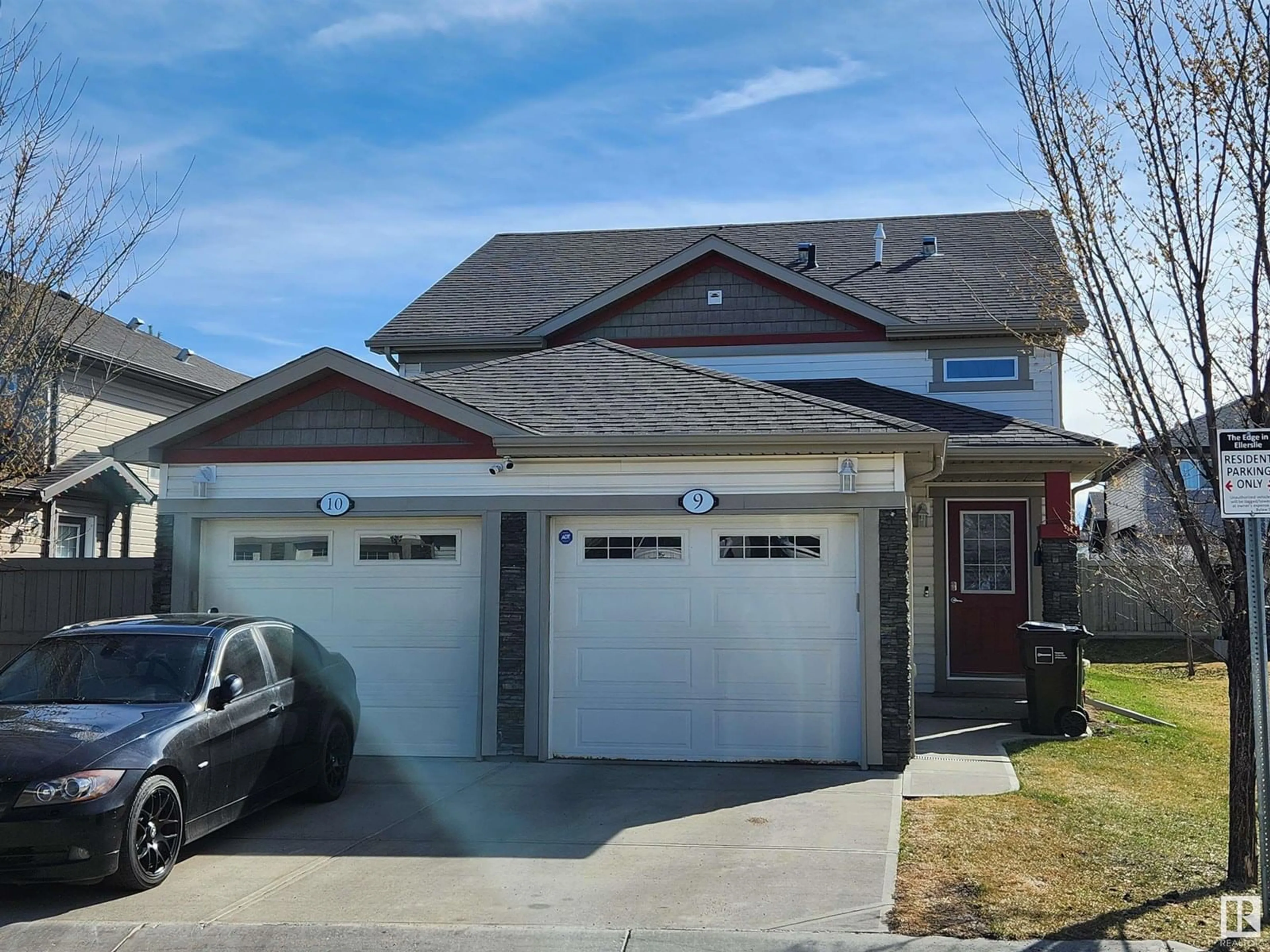 Home with vinyl exterior material, street for 6520 2 AV SW, Edmonton Alberta T6X1S4