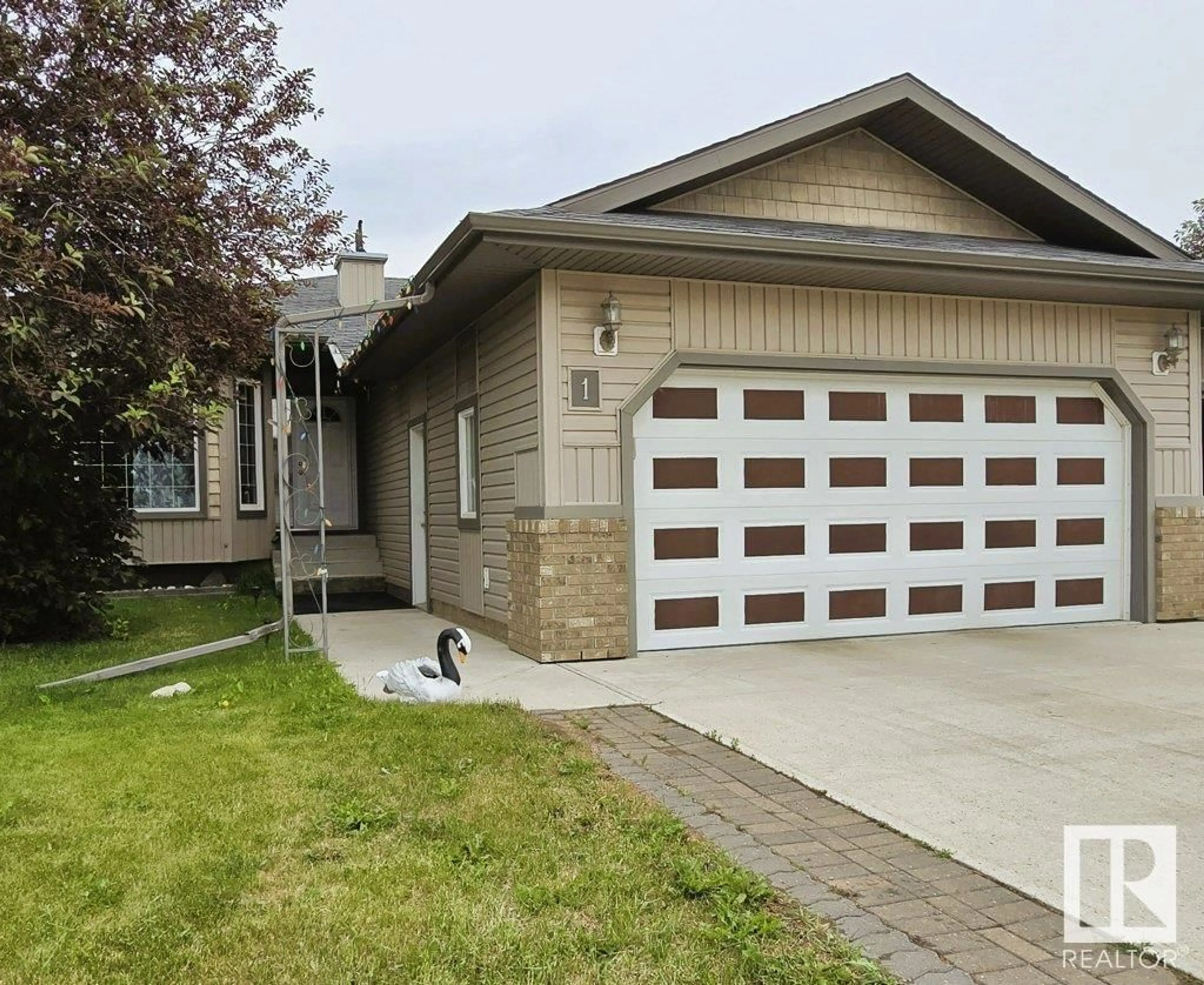 Home with vinyl exterior material, street for 1 NORDAL CLOSE, Wetaskiwin Alberta T9A0P1