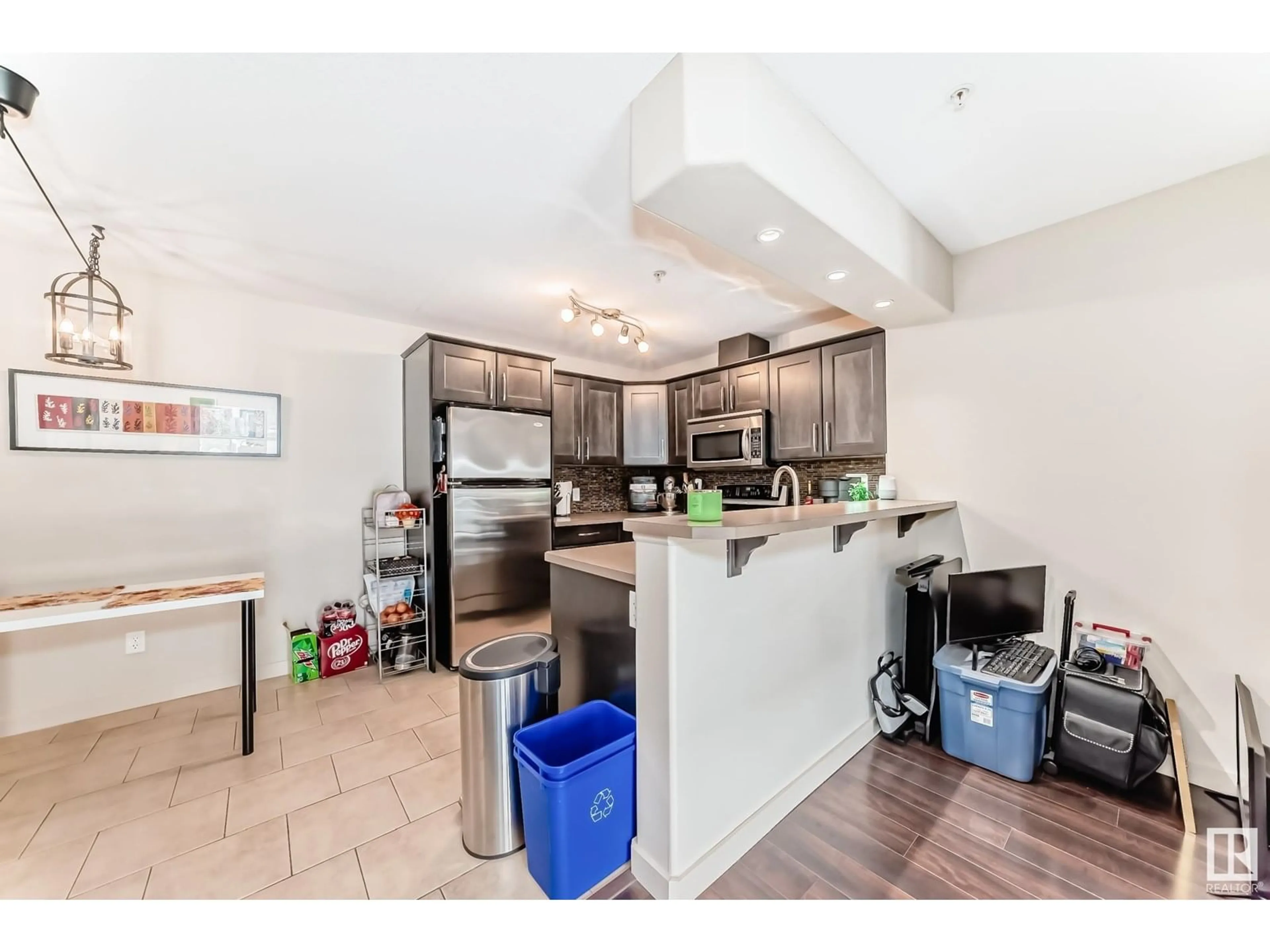 Open concept kitchen, ceramic/tile floor for #106 - 11615 ELLERSLIE RD, Edmonton Alberta T6W0J3