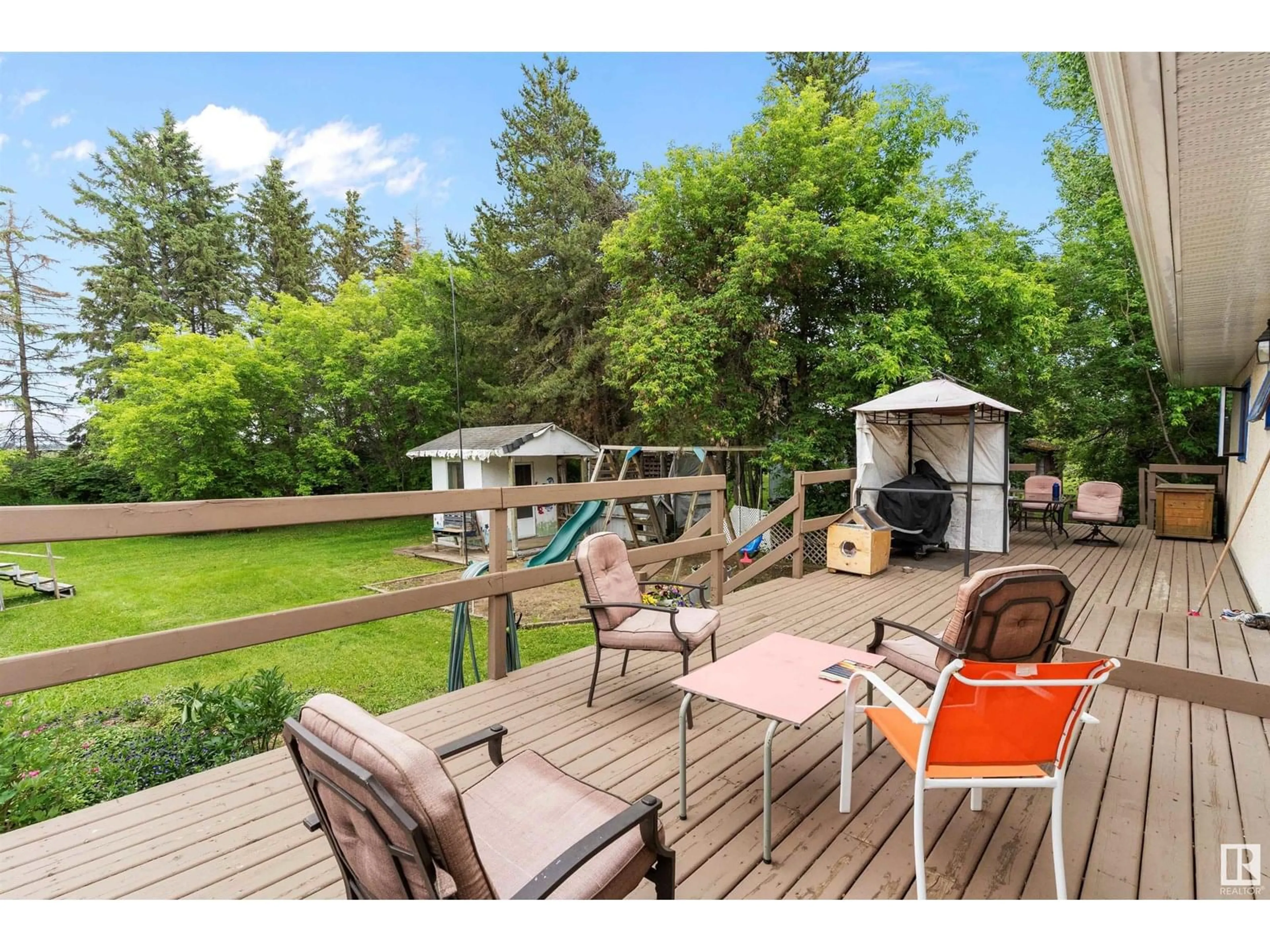 Patio, water/lake/river/ocean view for 461037A RGE RD 243, Rural Wetaskiwin County Alberta T9A1W8