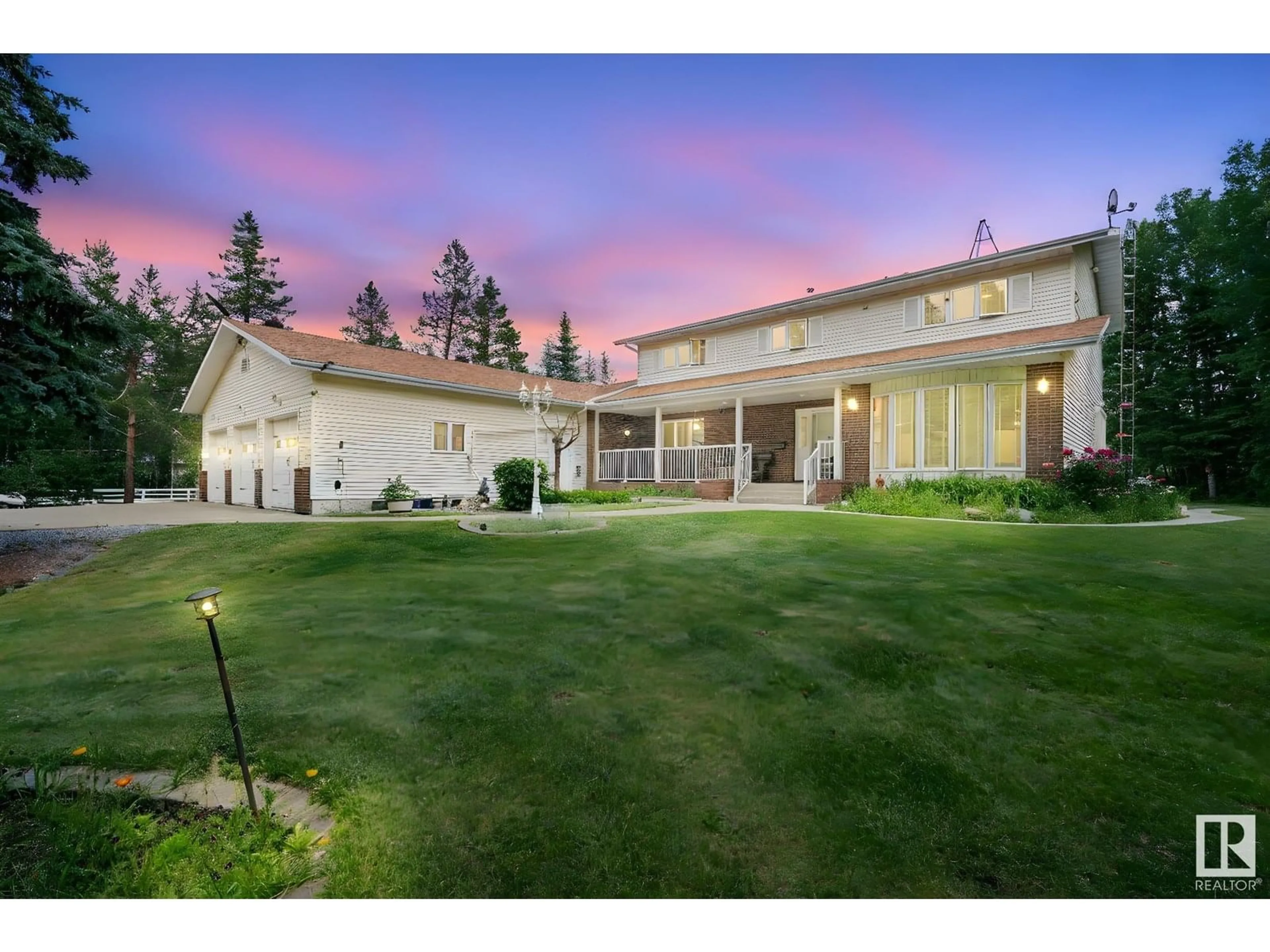 A pic from outside/outdoor area/front of a property/back of a property/a pic from drone, mountain view for 458 23109 TOWNSHIP ROAD 514, Rural Strathcona County Alberta T8B1K9