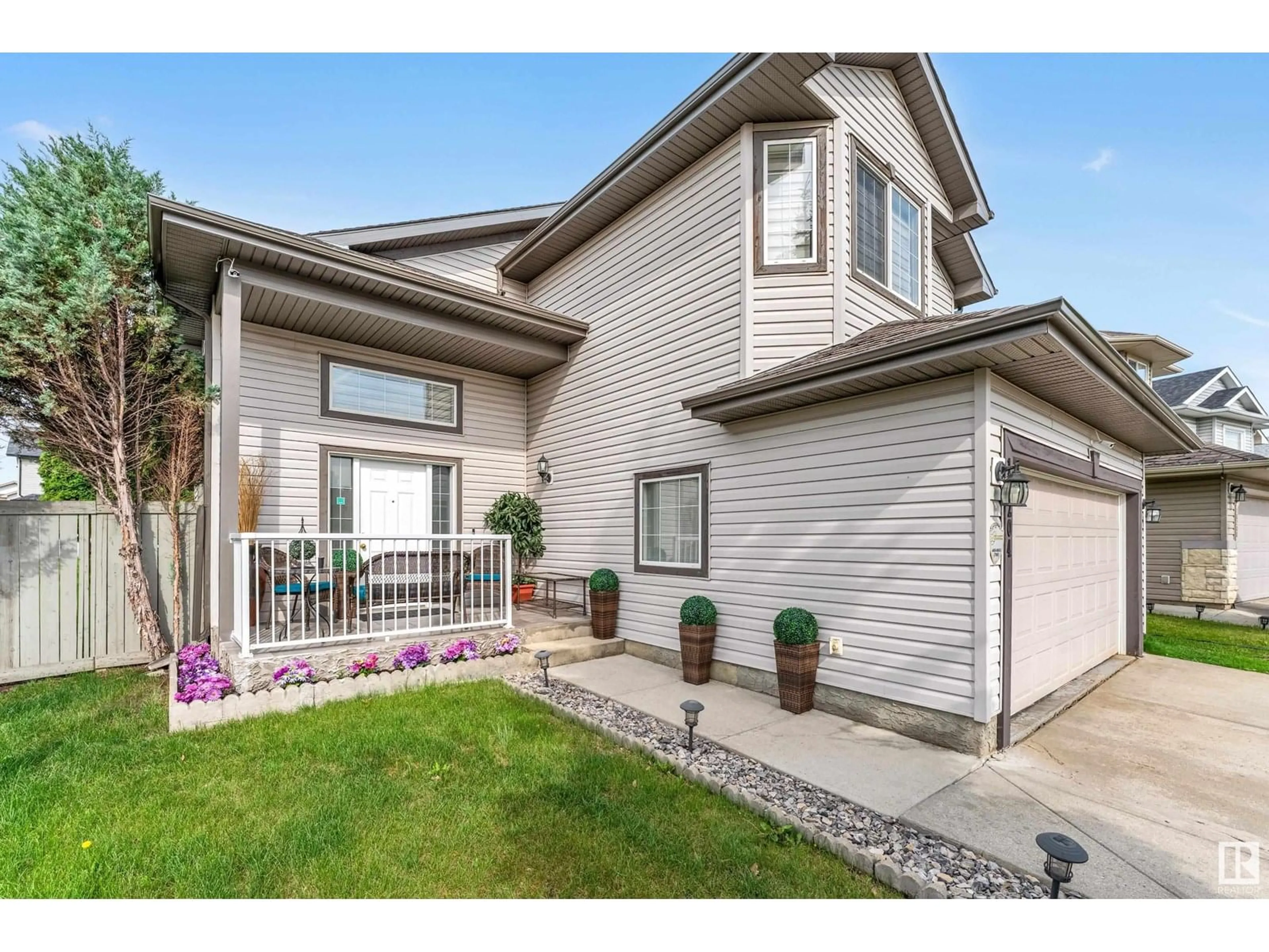 Home with vinyl exterior material, street for 18204 107 ST, Edmonton Alberta T5X6G4