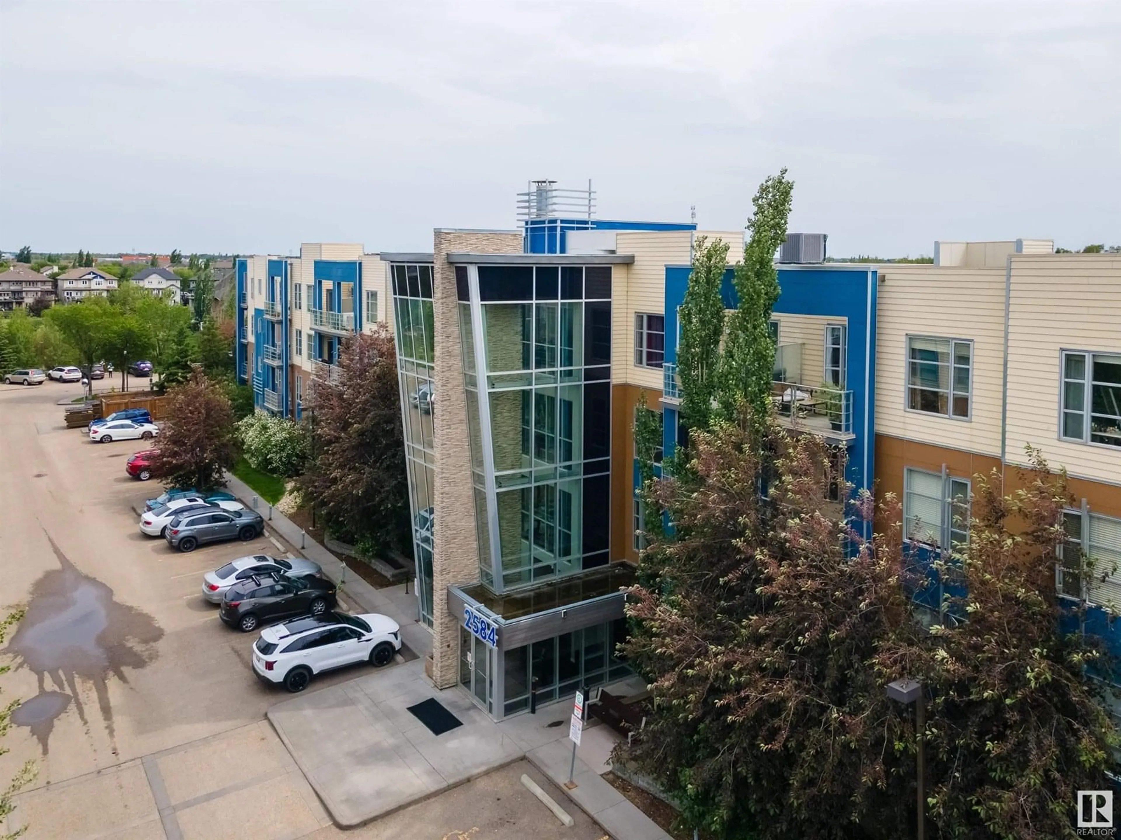 A pic from outside/outdoor area/front of a property/back of a property/a pic from drone, city buildings view from balcony for #105 - 2584 ANDERSON WY, Edmonton Alberta T6W0R2