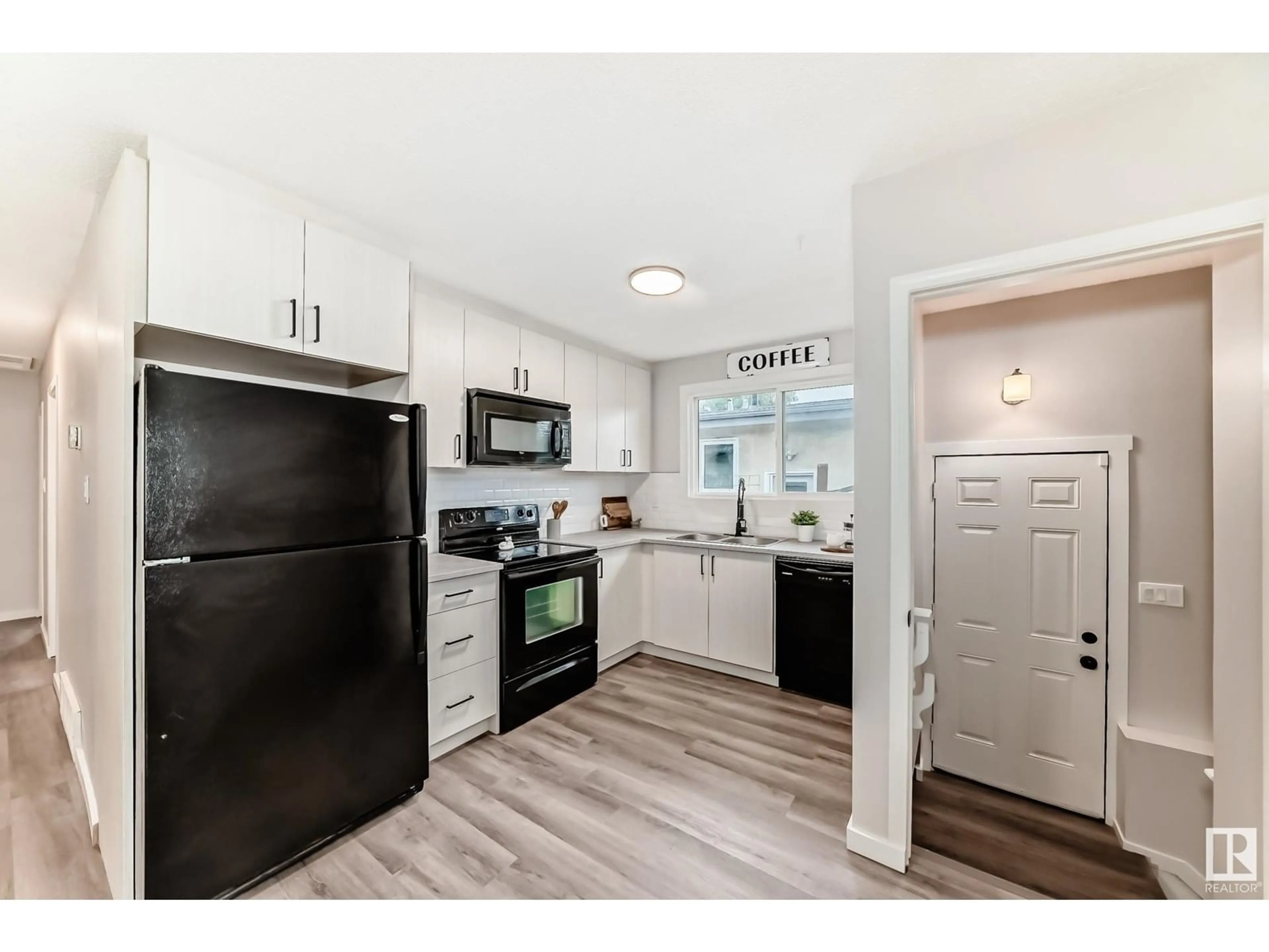 Open concept kitchen, unknown for 8405 134 AV, Edmonton Alberta T5E1G4