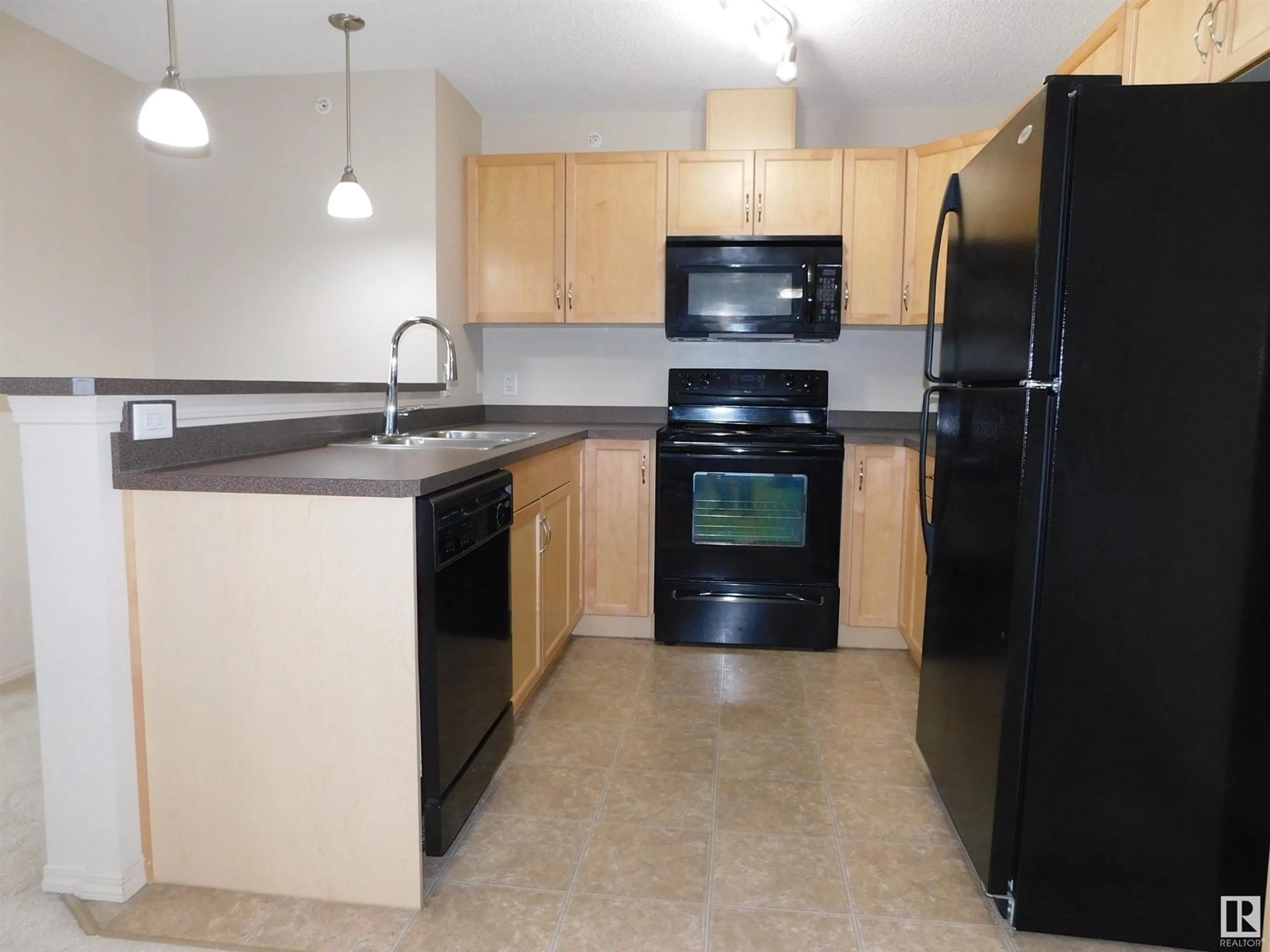 Standard kitchen, unknown for #405 - 5951 165 AV, Edmonton Alberta T5Y0J6
