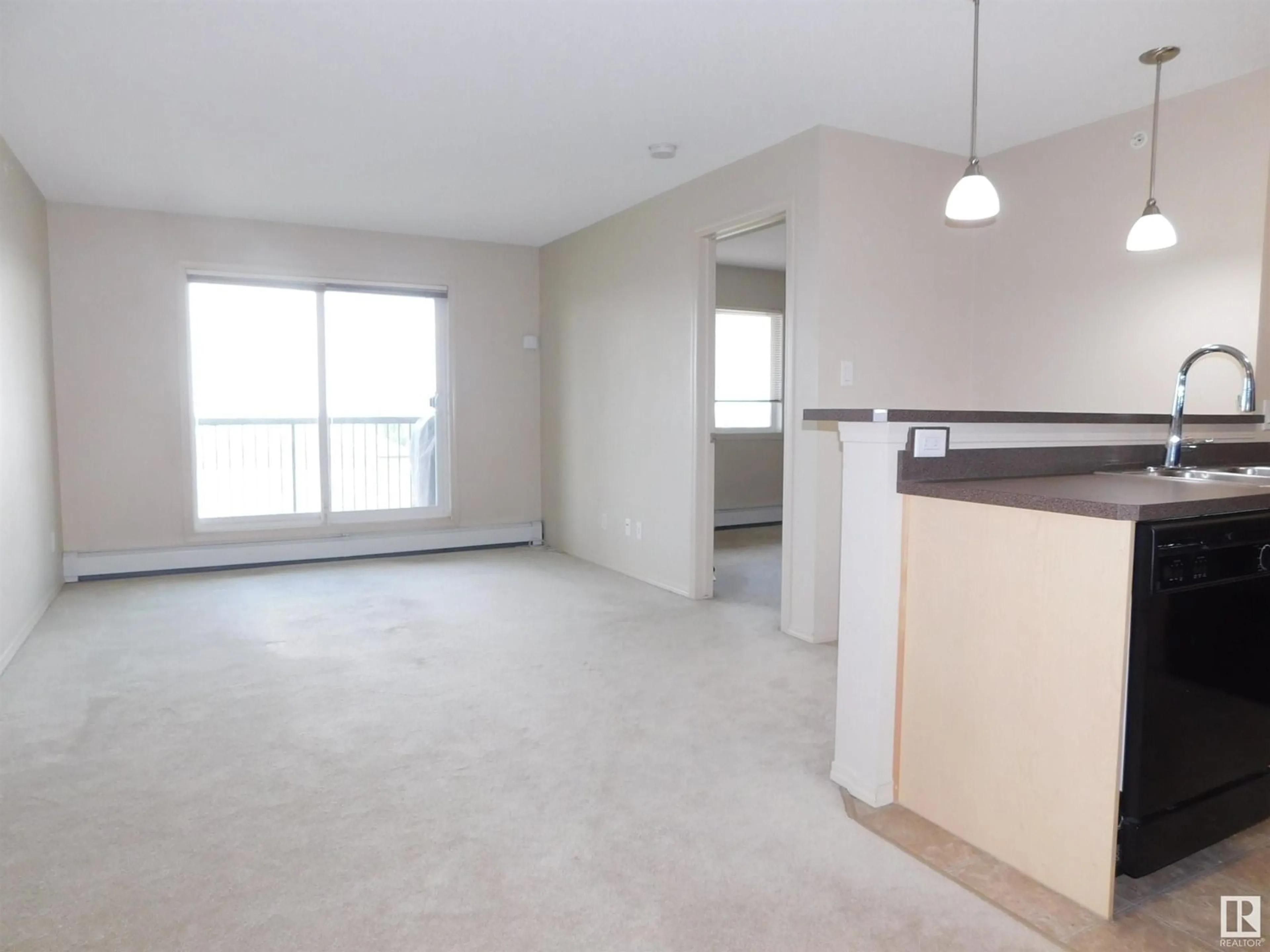 A pic of a room for #405 - 5951 165 AV, Edmonton Alberta T5Y0J6