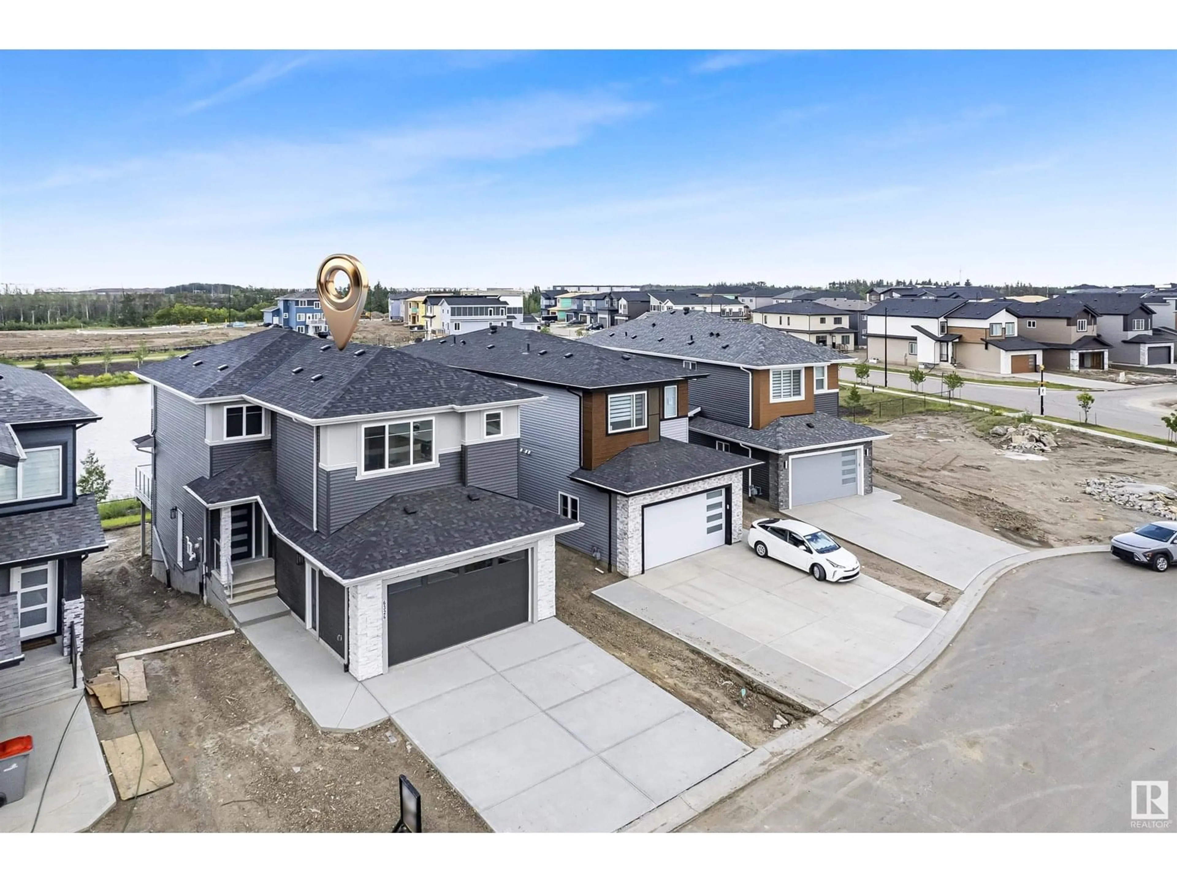 A pic from outside/outdoor area/front of a property/back of a property/a pic from drone, street for 6326 17 ST, Rural Leduc County Alberta T4X3C7