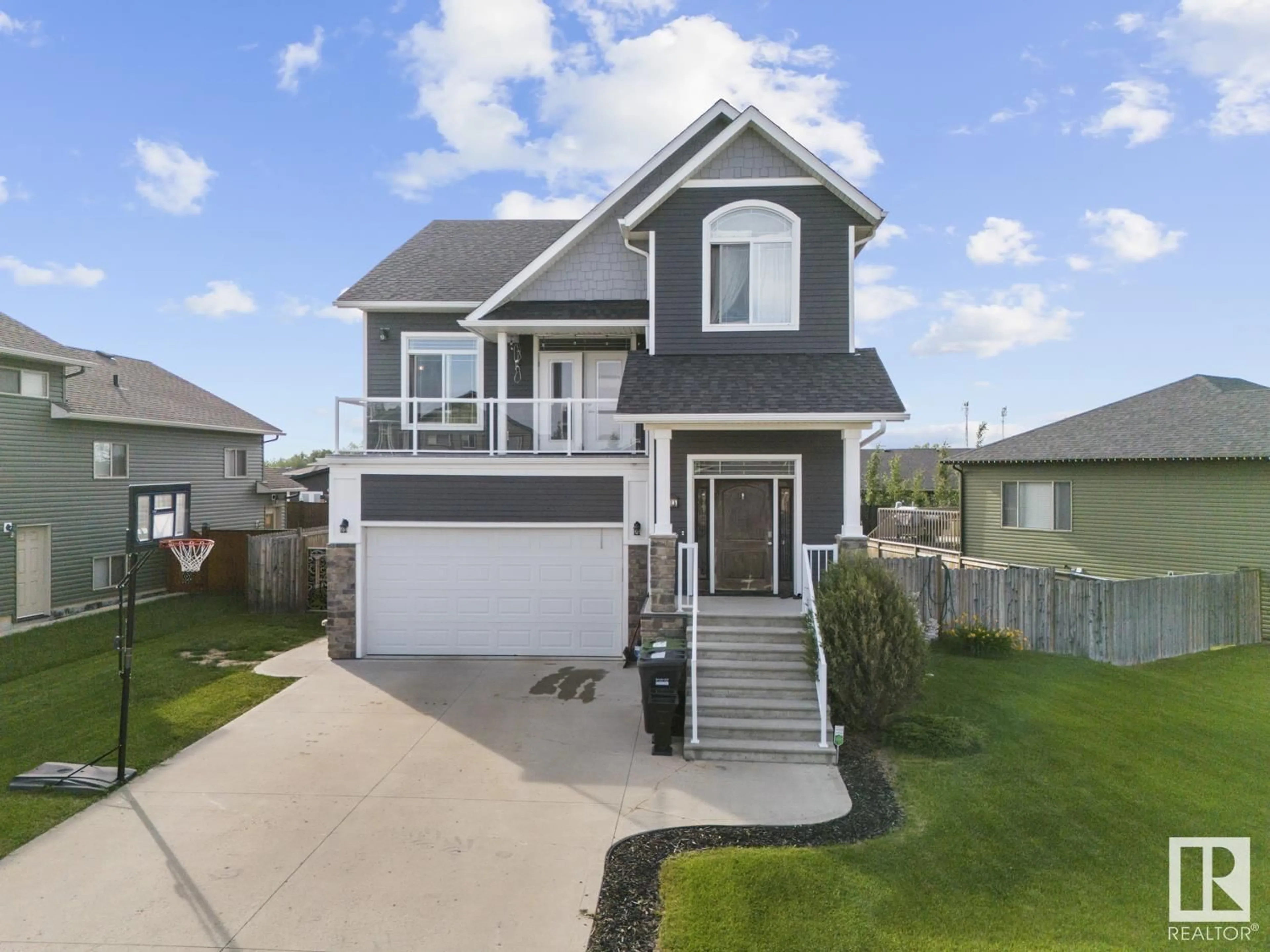 Home with vinyl exterior material, street for 33 FALCON RD, Cold Lake Alberta T9M0G4