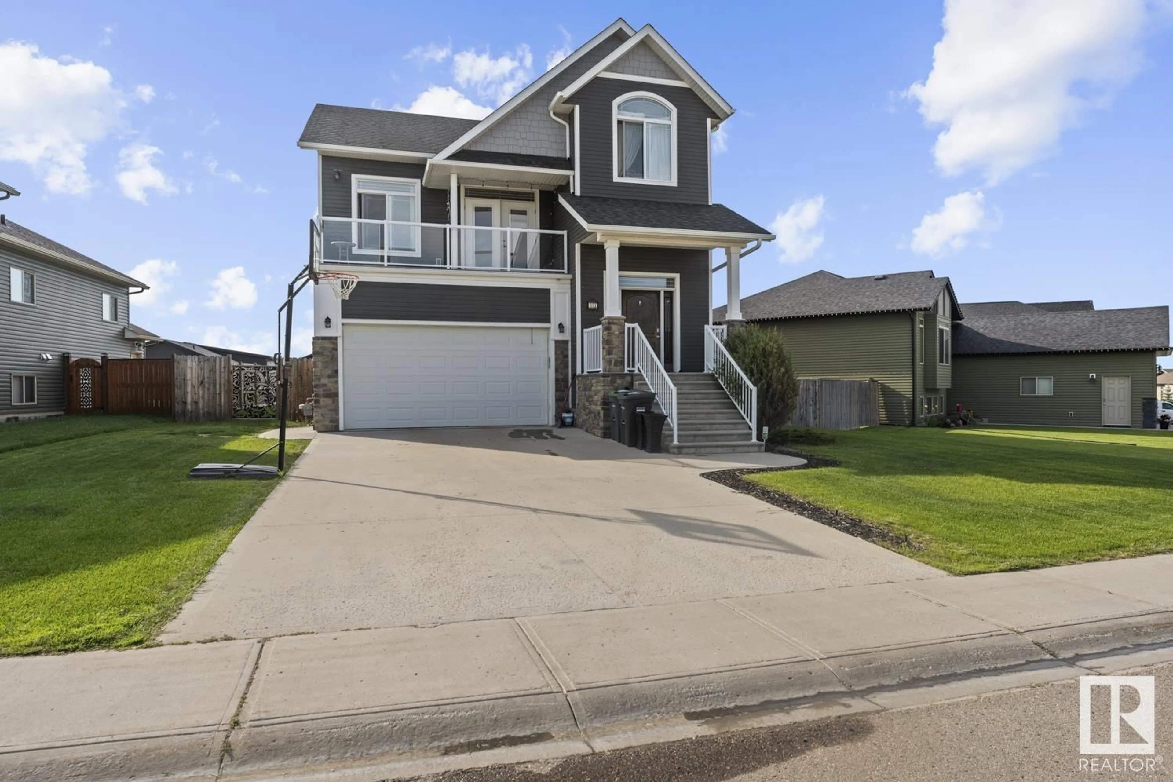 Home with vinyl exterior material, street for 33 FALCON RD, Cold Lake Alberta T9M0G4