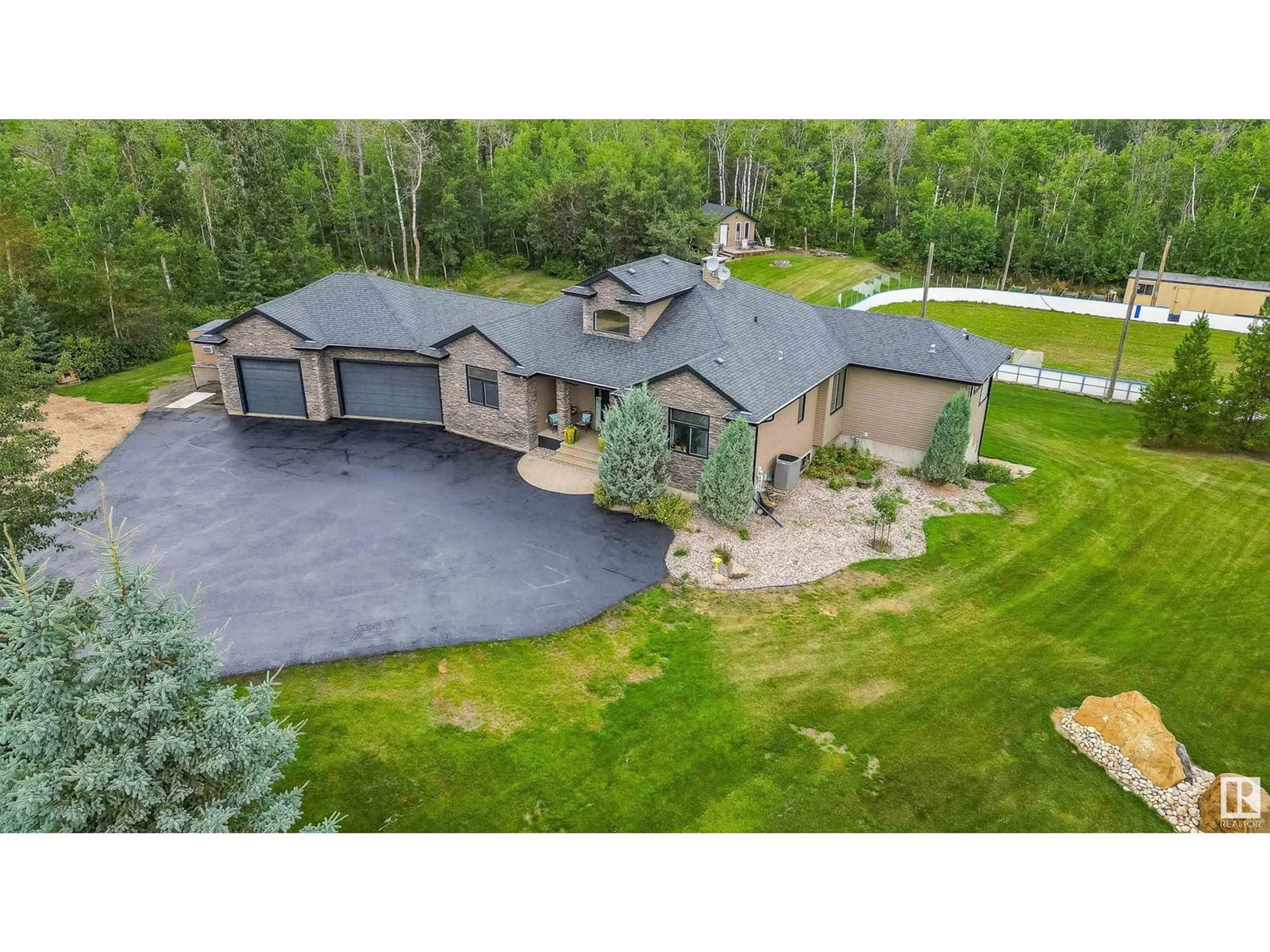 A pic from outside/outdoor area/front of a property/back of a property/a pic from drone, unknown for 53025 RGE RD 223, Rural Strathcona County Alberta T8E2M3