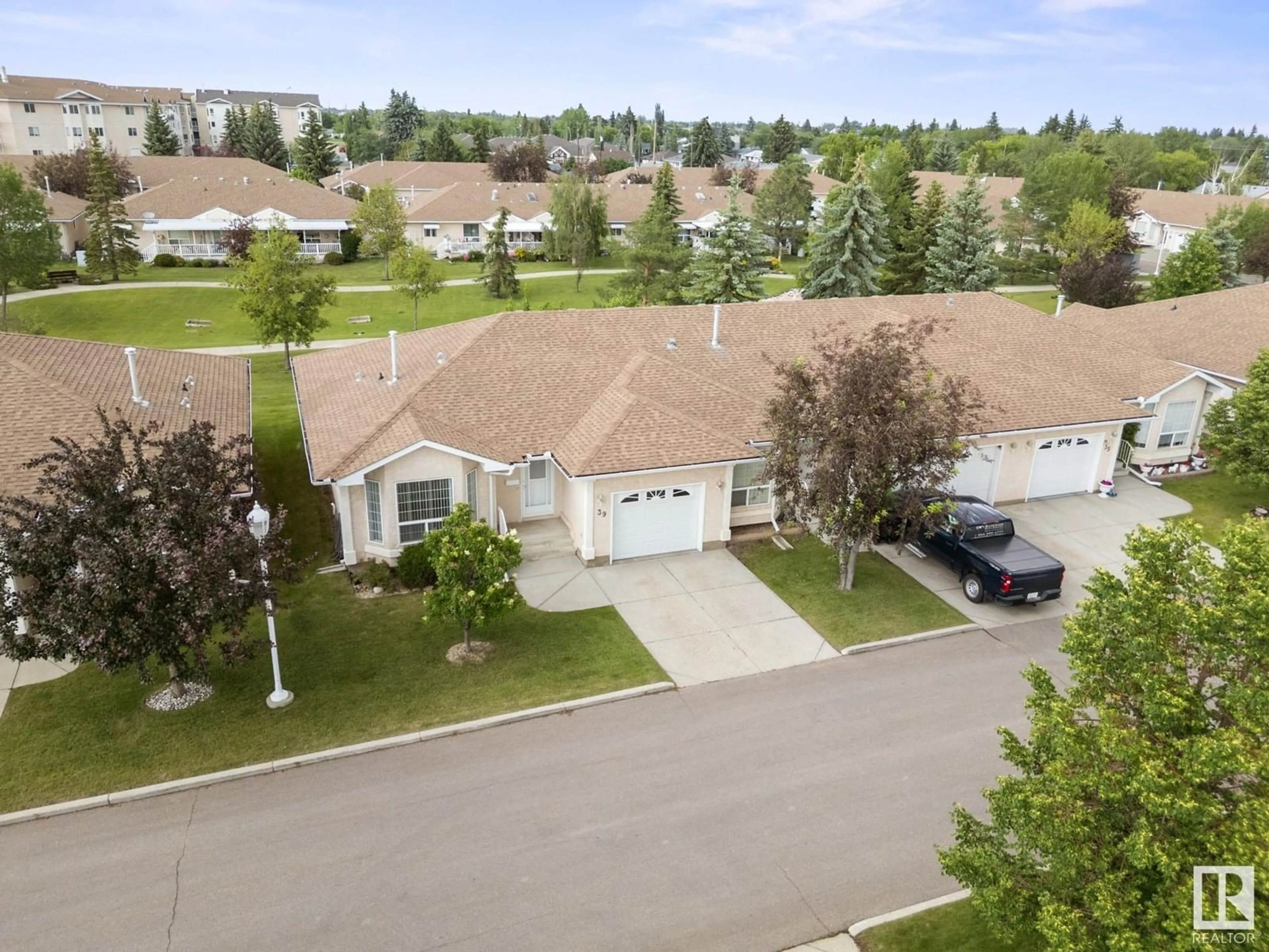 A pic from outside/outdoor area/front of a property/back of a property/a pic from drone, street for #39 - 13320 124 ST, Edmonton Alberta T5L5B7