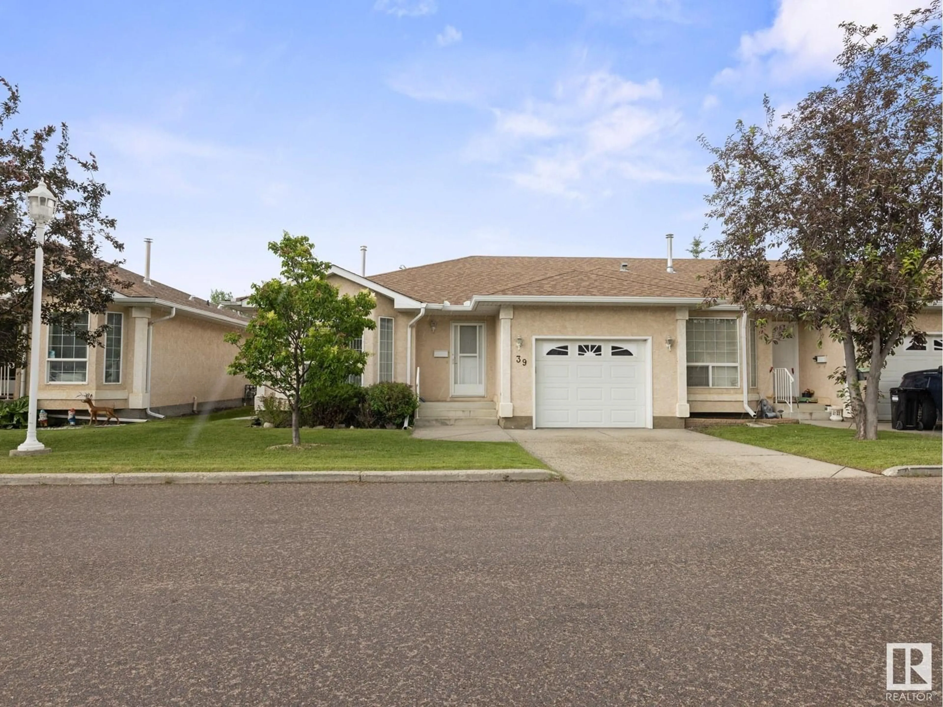 Home with vinyl exterior material, street for #39 - 13320 124 ST, Edmonton Alberta T5L5B7