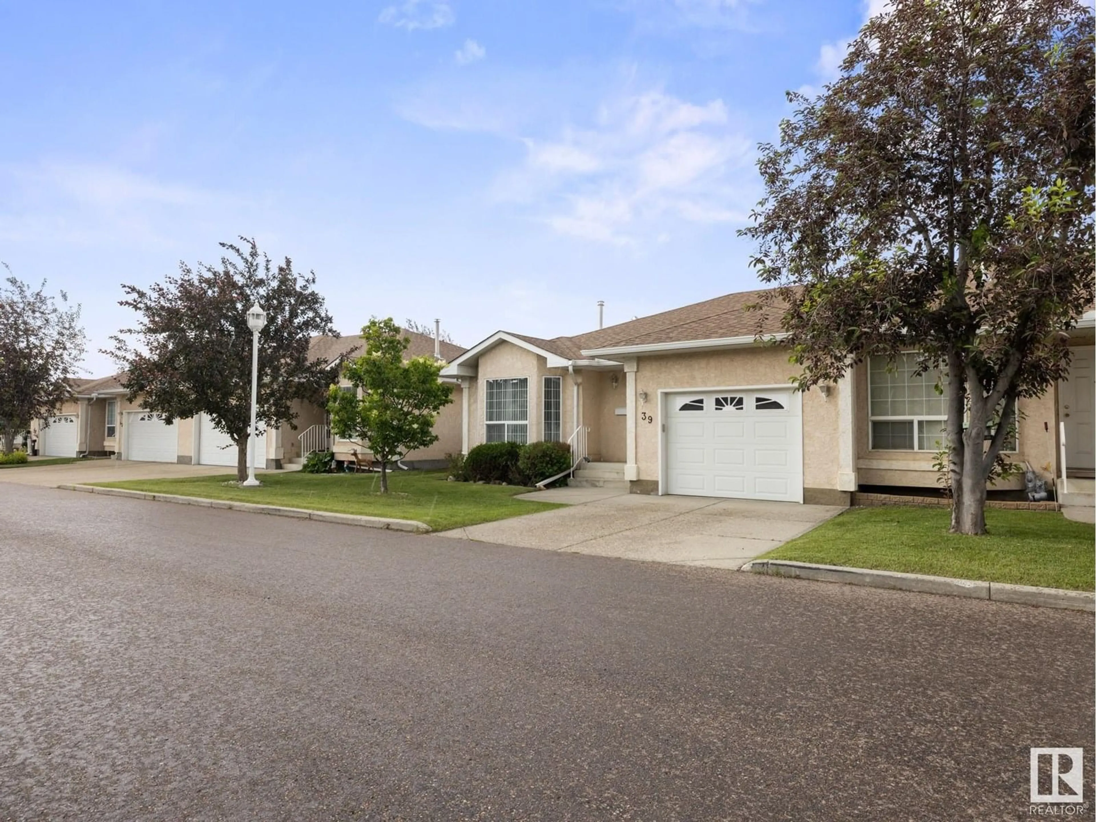 Home with vinyl exterior material, street for #39 - 13320 124 ST, Edmonton Alberta T5L5B7