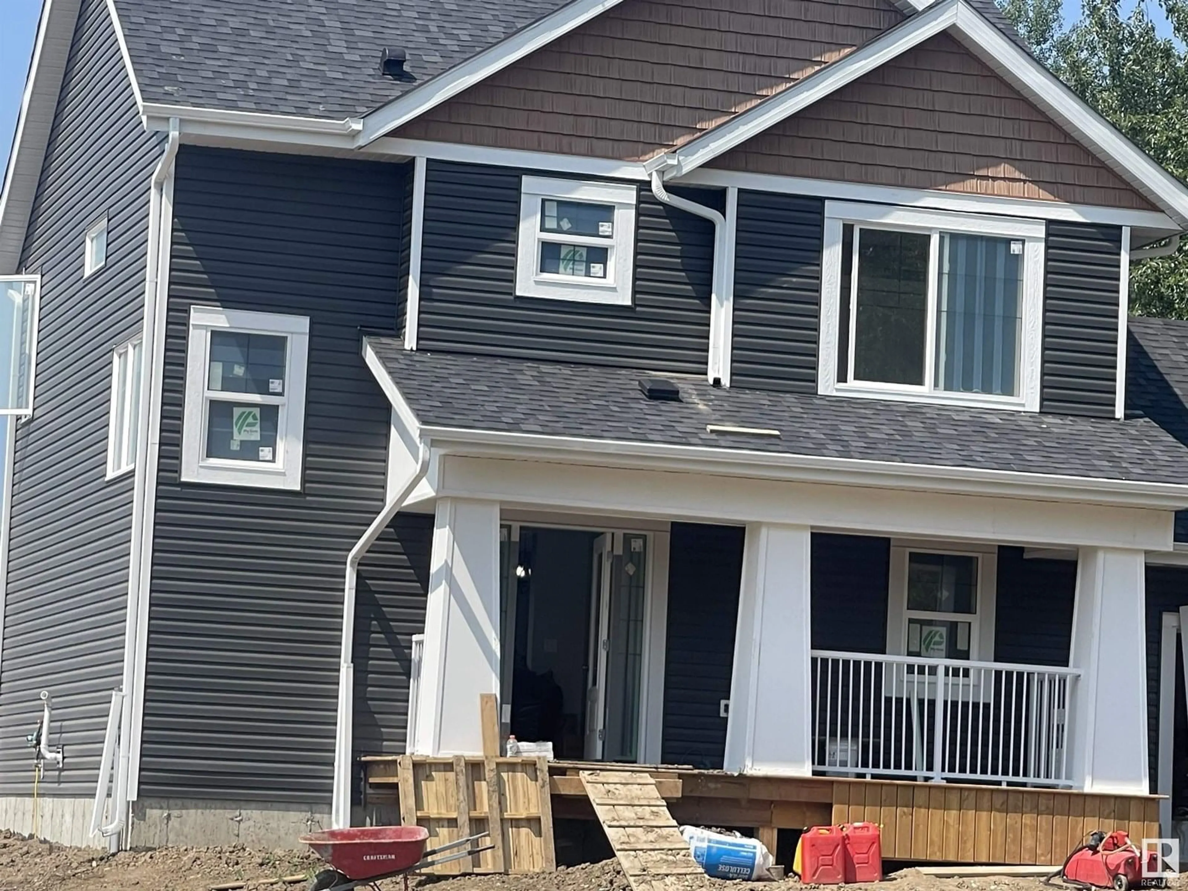 Home with vinyl exterior material, street for 54032 RGE ROAD 51, Rural Lac Ste. Anne County Alberta T0E0L0