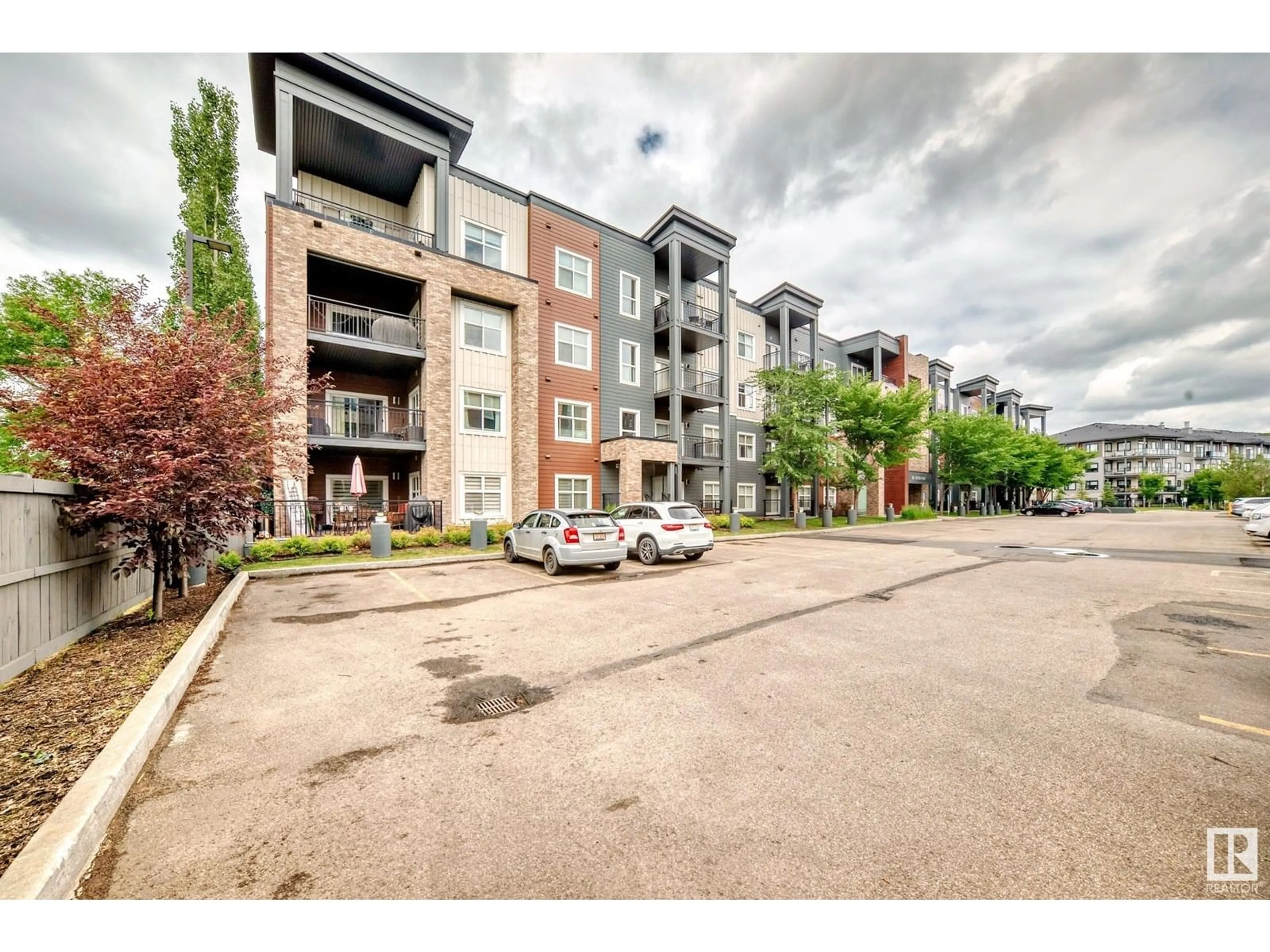 A pic from outside/outdoor area/front of a property/back of a property/a pic from drone, unknown for 508 - 225 GRIESBACH PR, Edmonton Alberta T5E6V9