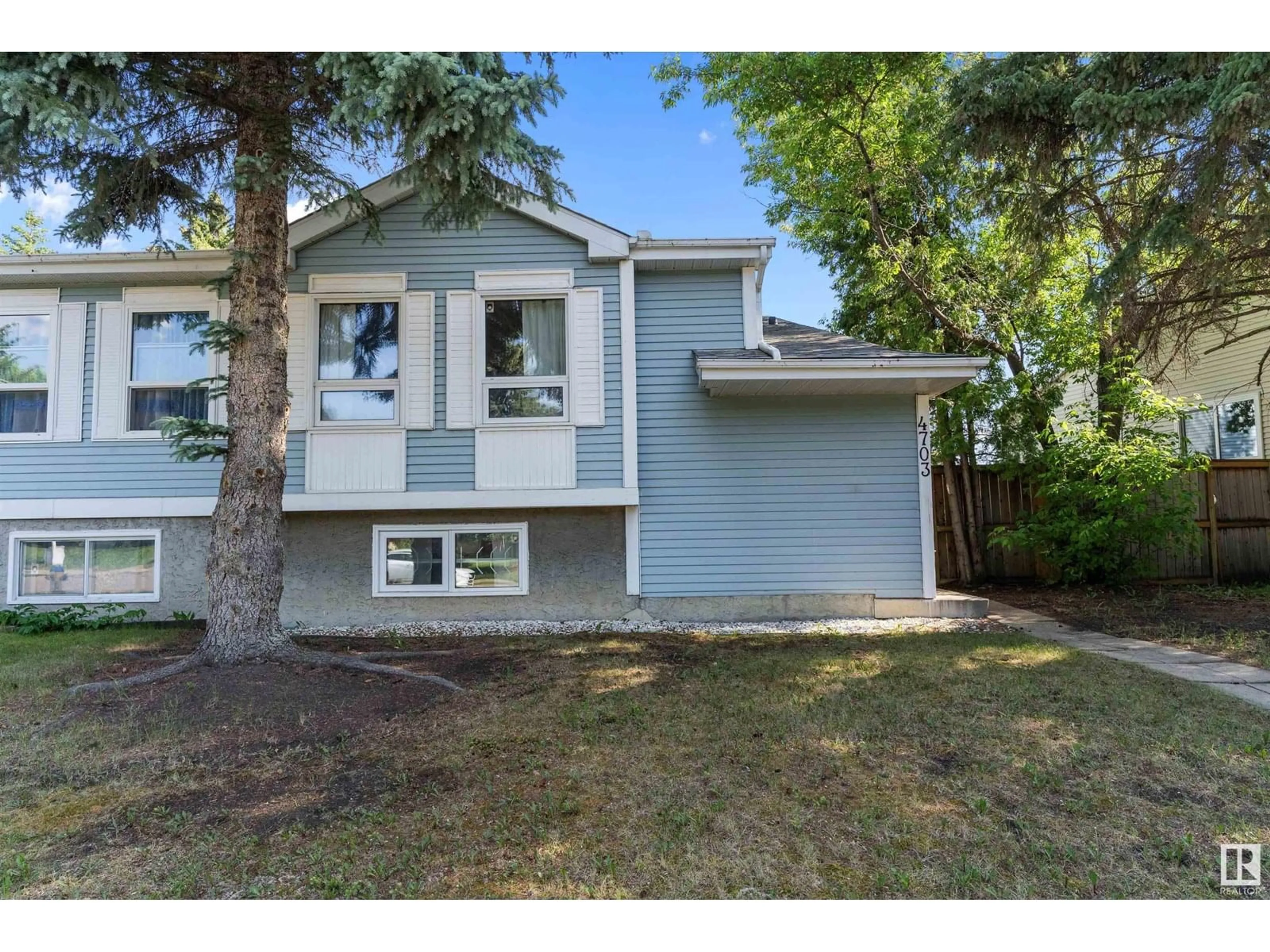 Home with vinyl exterior material, street for 4703 36 AV, Edmonton Alberta T6L3S2