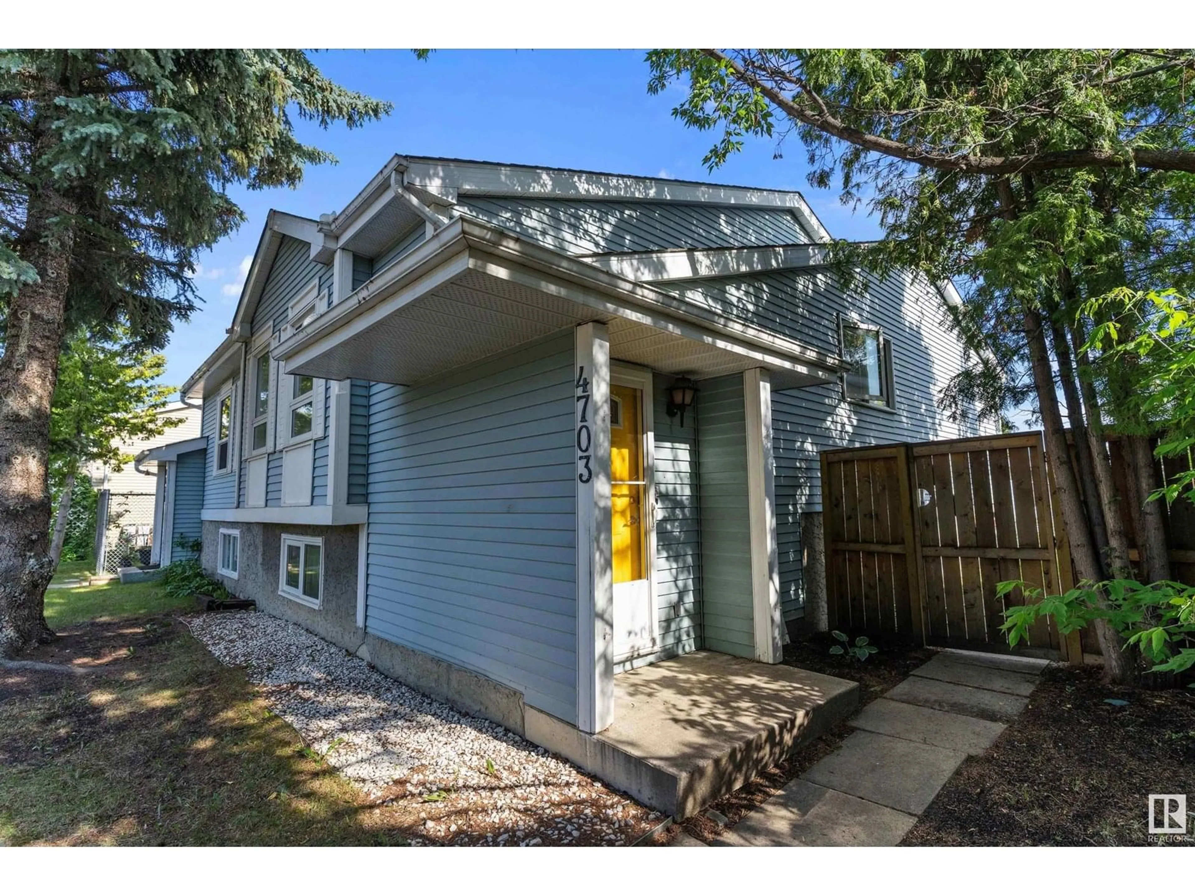Home with vinyl exterior material, street for 4703 36 AV, Edmonton Alberta T6L3S2