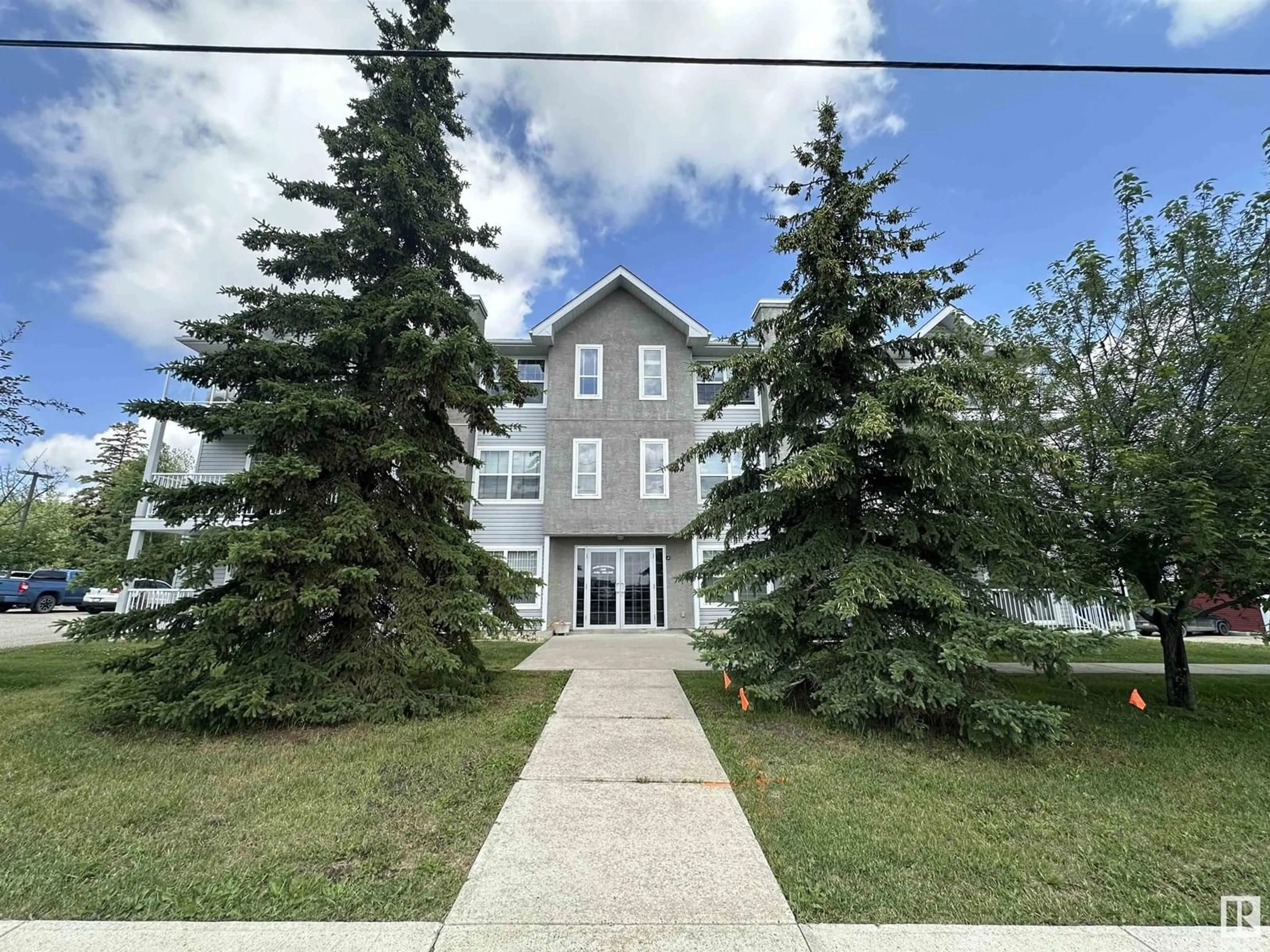 A pic from outside/outdoor area/front of a property/back of a property/a pic from drone, building for 103 - 4104 50 AVENUE, Drayton Valley Alberta T7A0A3