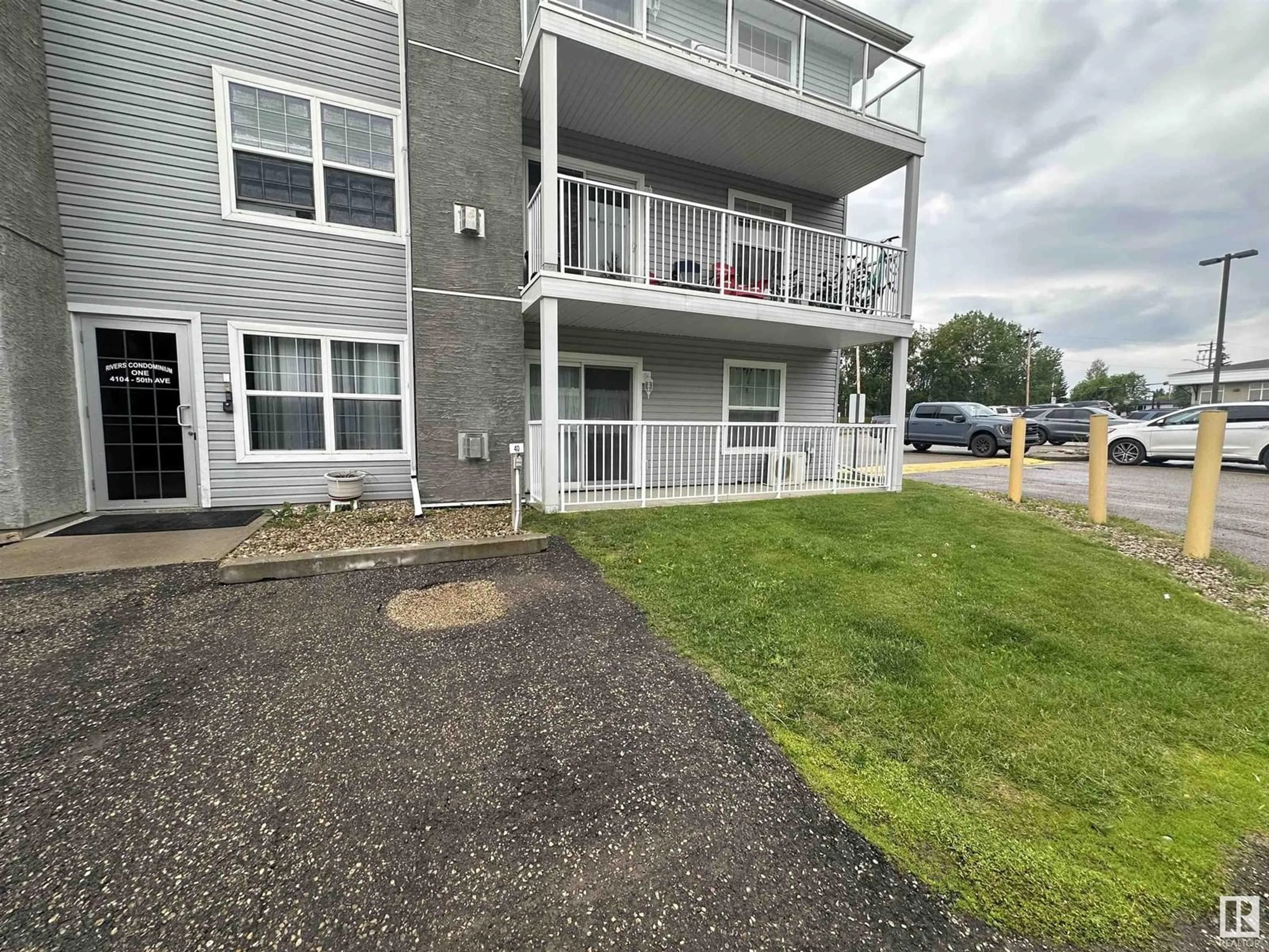 A pic from outside/outdoor area/front of a property/back of a property/a pic from drone, unknown for 103 - 4104 50 AVENUE, Drayton Valley Alberta T7A0A3