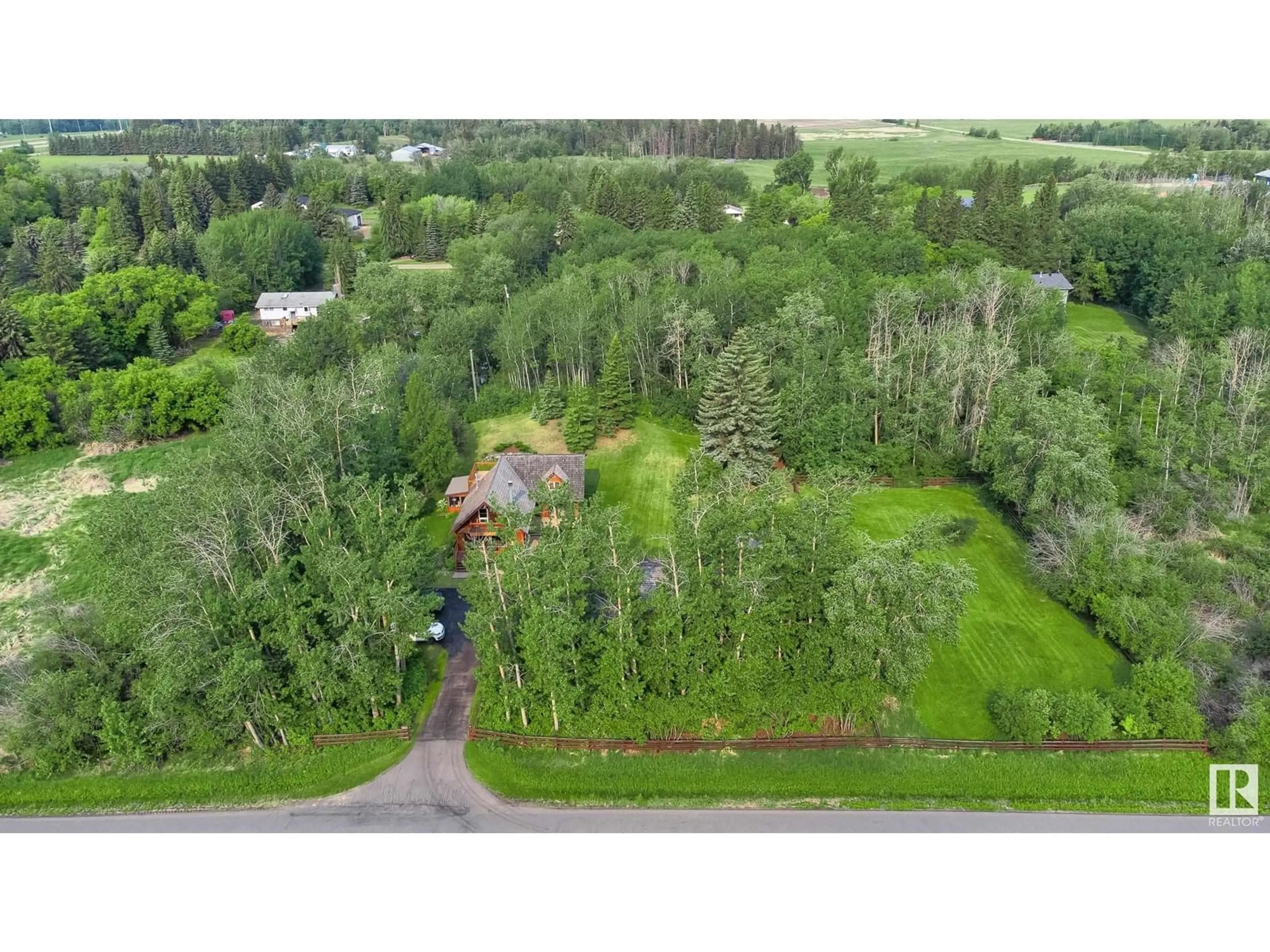 A pic from outside/outdoor area/front of a property/back of a property/a pic from drone, forest/trees view for 51566 RGE ROAD 232, Rural Strathcona County Alberta T8B1B1