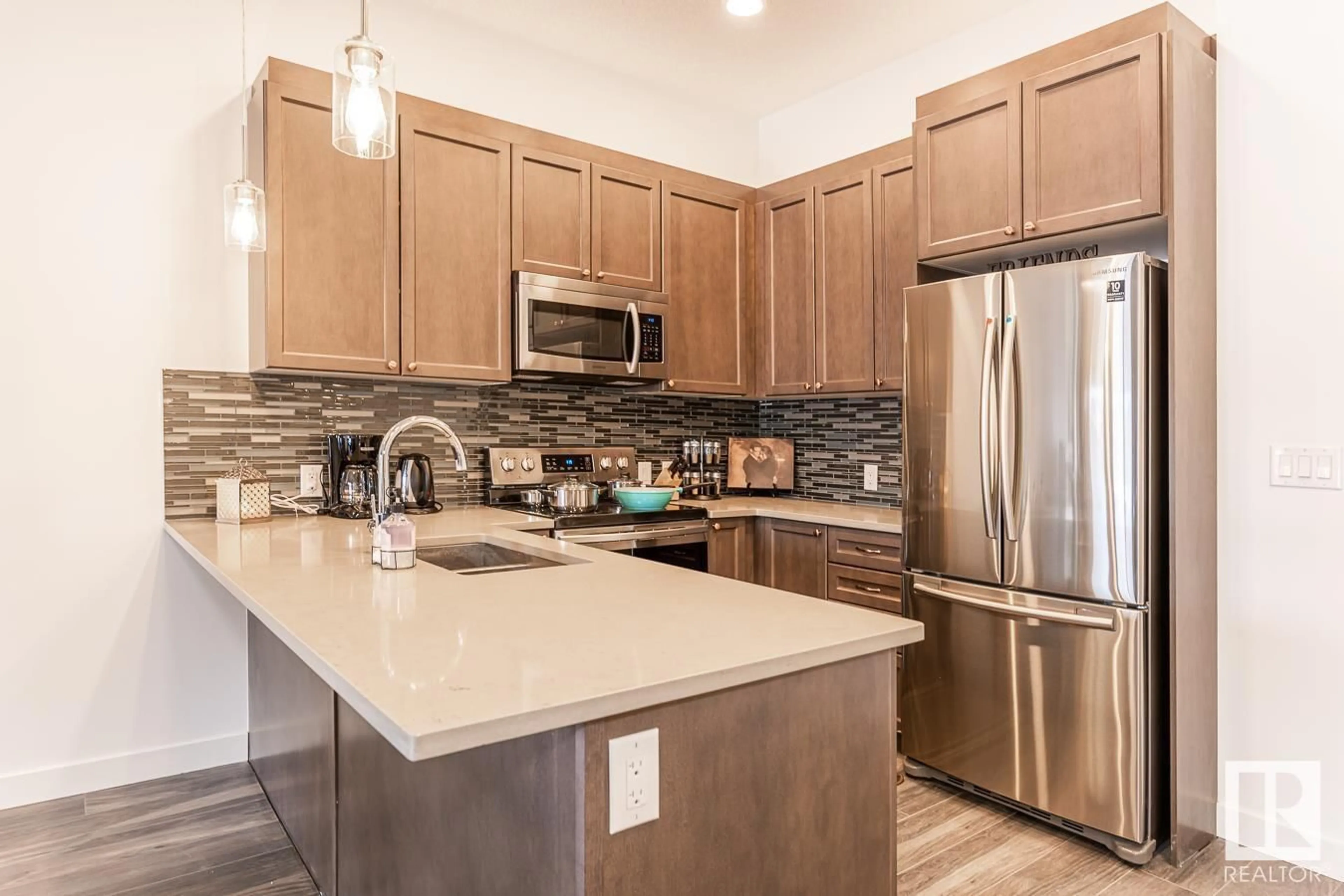 Open concept kitchen, ceramic/tile floor for #102 - 1316 WINDERMERE WY, Edmonton Alberta T6W2J3
