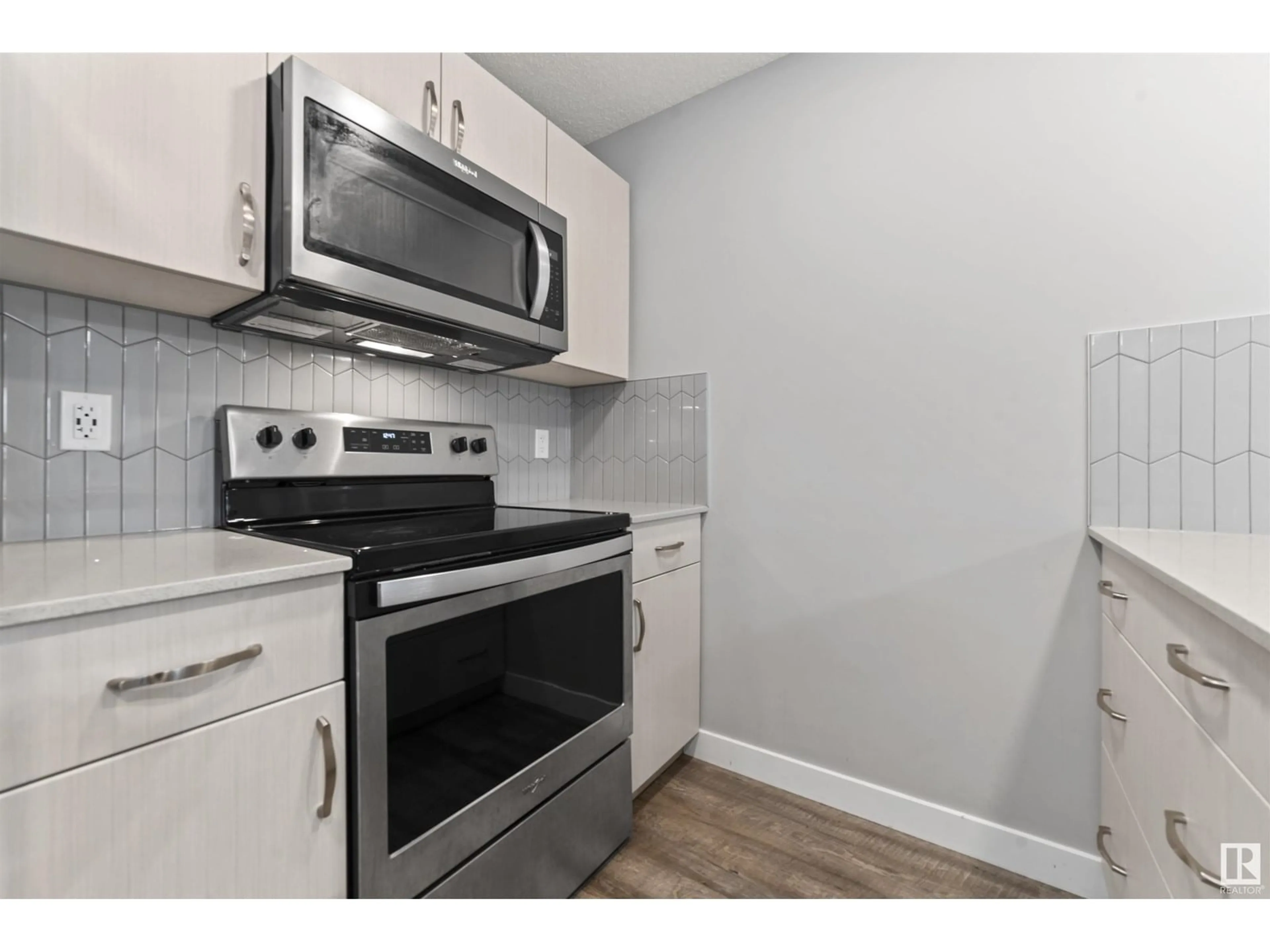 Standard kitchen, wood/laminate floor for 310 - 1506 TAMARACK BV, Edmonton Alberta T6T2J5