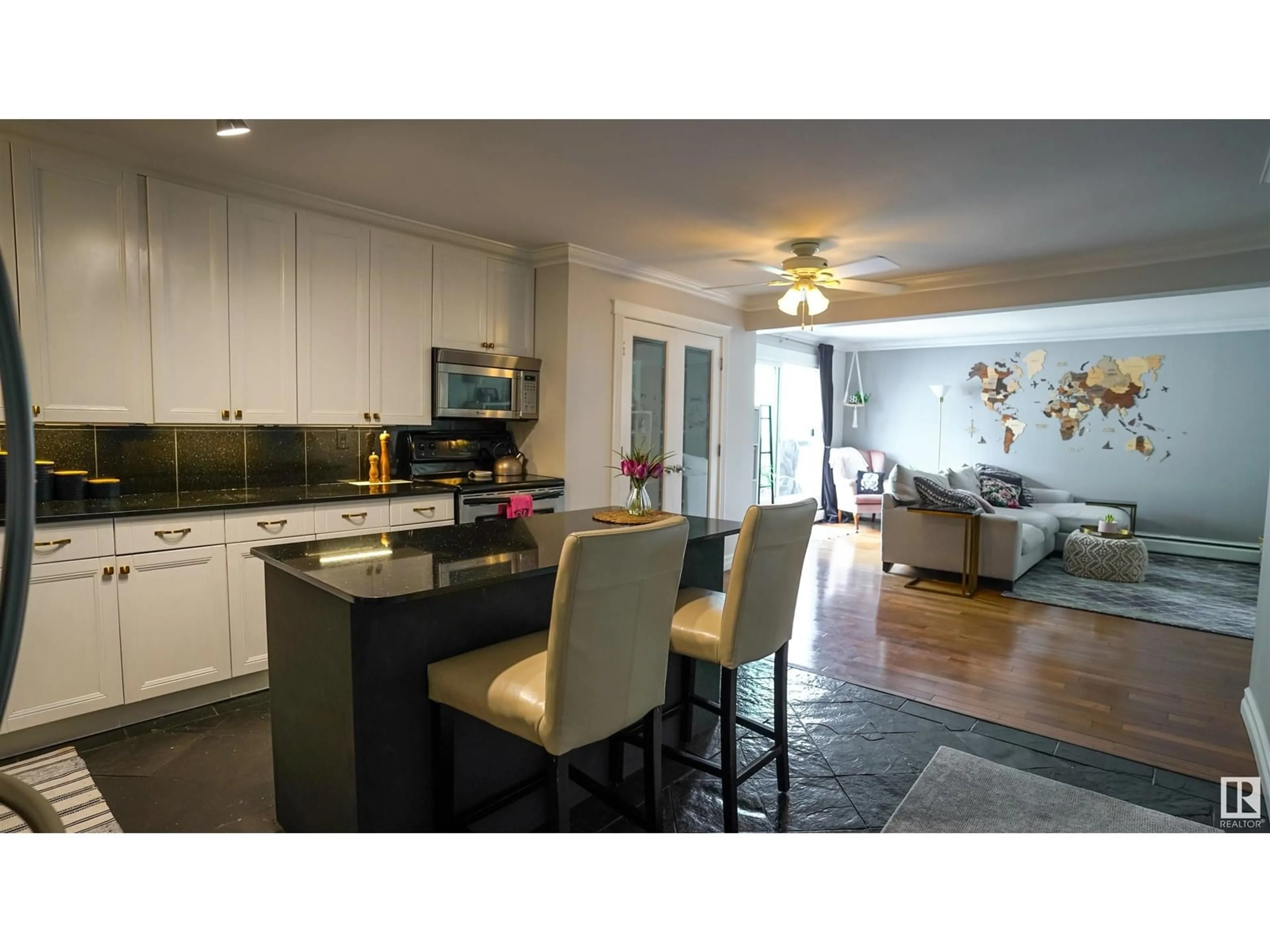 Open concept kitchen, wood/laminate floor for 404 - 10165 113 ST NW, Edmonton Alberta T5K1P1