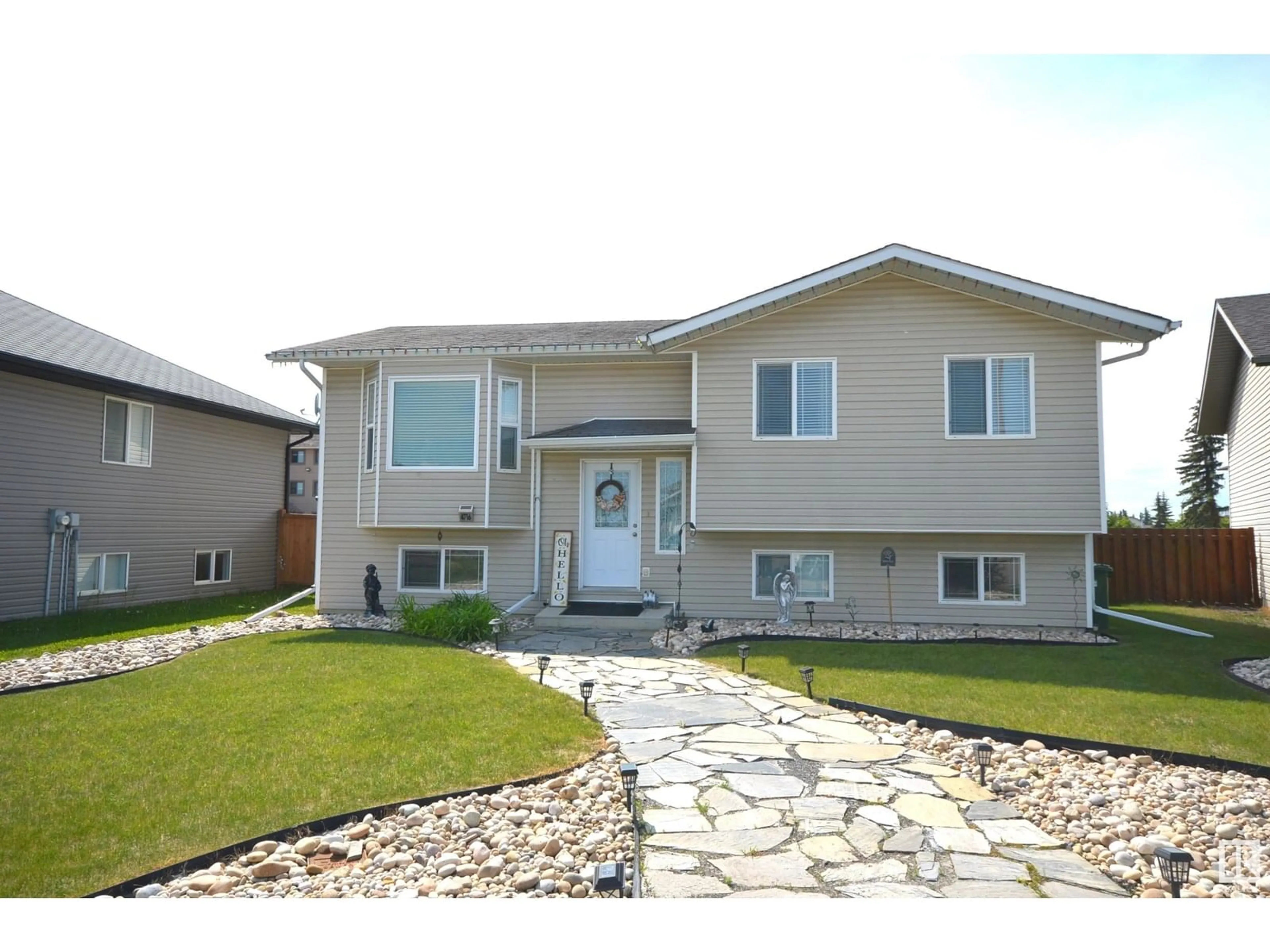 Home with vinyl exterior material, street for 4716 39 ST, Bonnyville Town Alberta T9N0A3