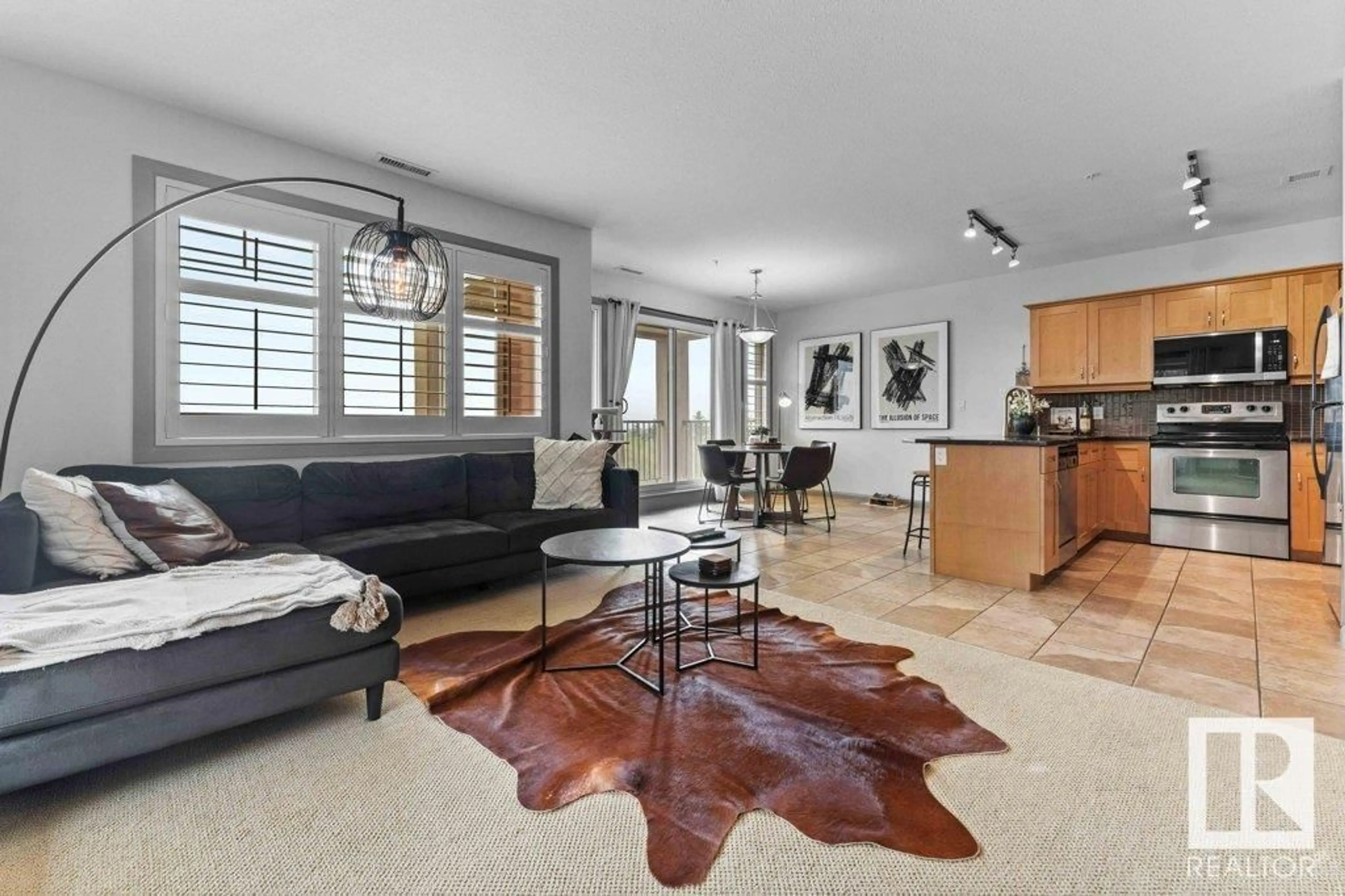Living room with furniture, ceramic/tile floor for 317 - 501 PALISADES WY, Sherwood Park Alberta T8H0H8