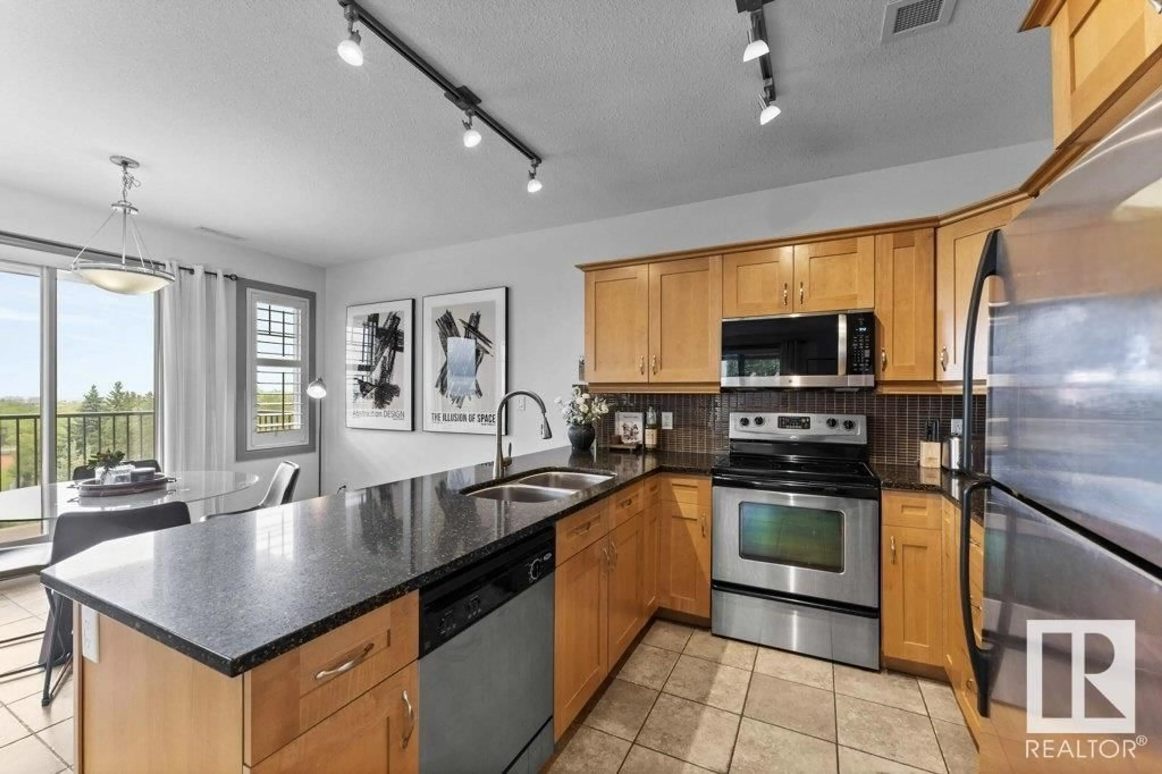 Open concept kitchen, ceramic/tile floor for 317 - 501 PALISADES WY, Sherwood Park Alberta T8H0H8