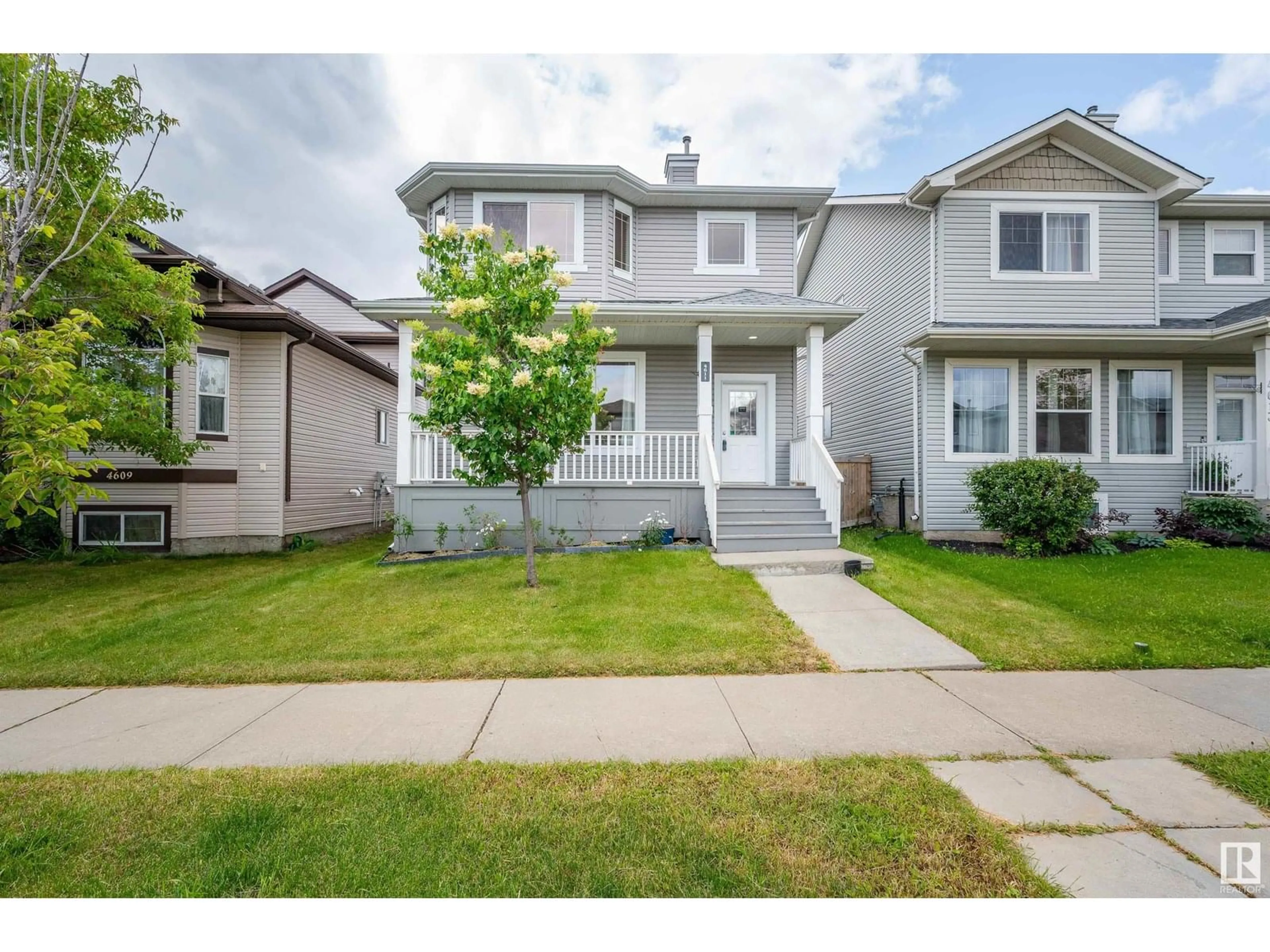 Home with vinyl exterior material, street for 4611 160 AV, Edmonton Alberta T5Y0G9