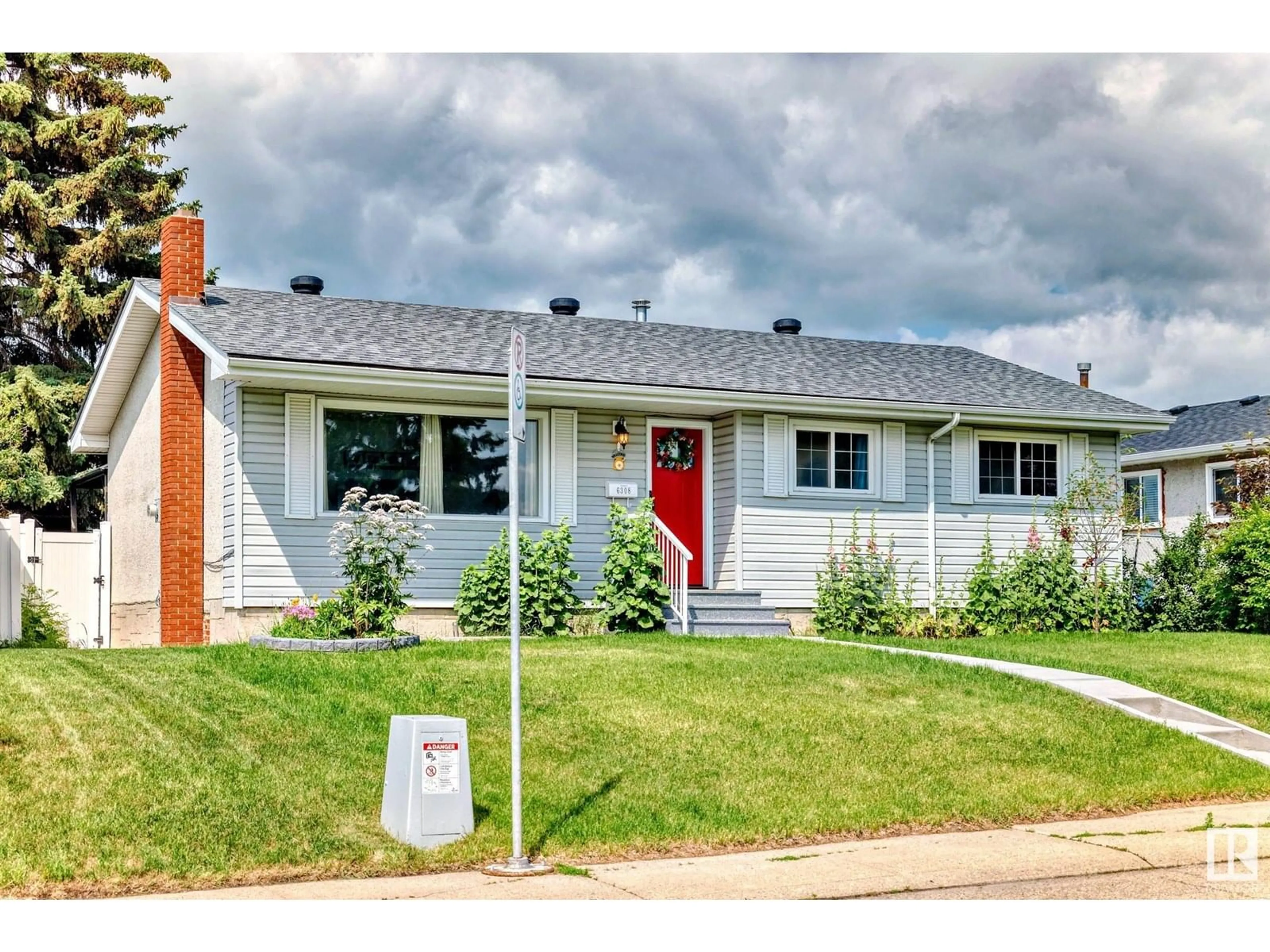 Home with vinyl exterior material, street for 6308 144A AV, Edmonton Alberta T5A1S4