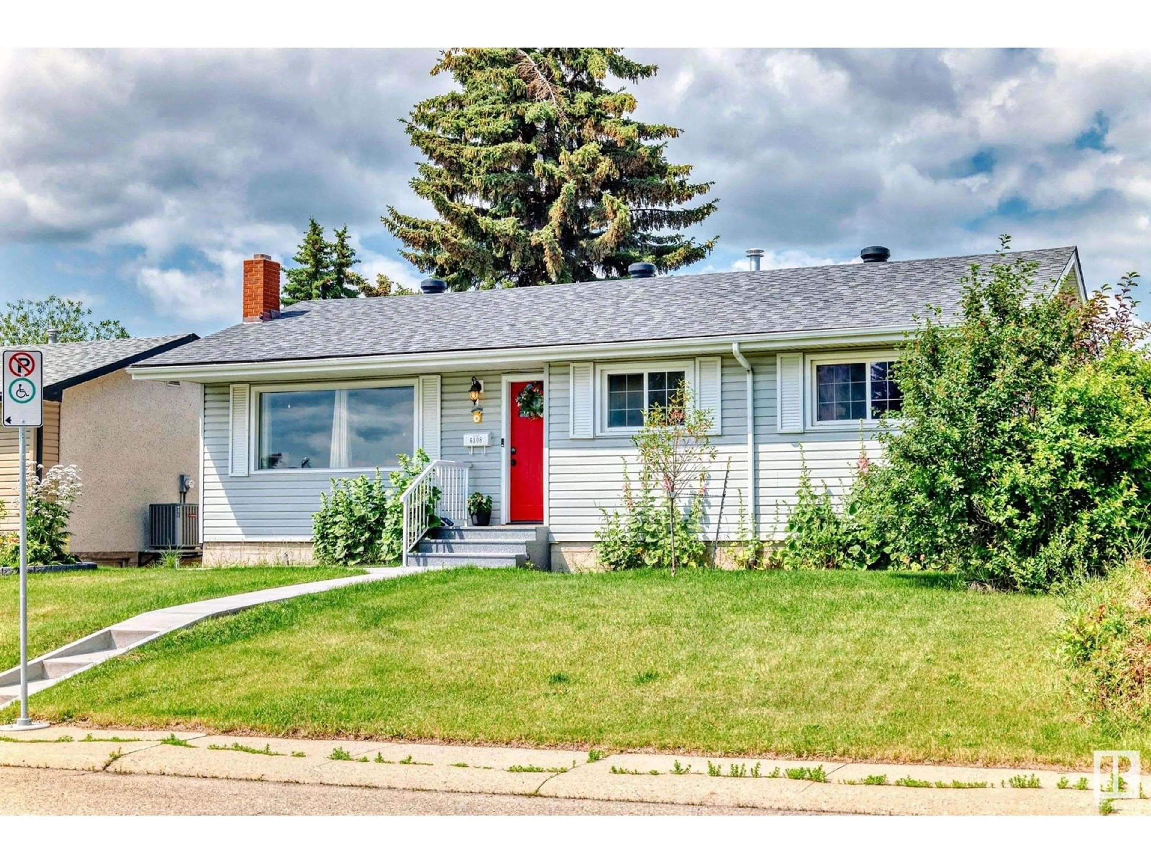 Home with vinyl exterior material, street for 6308 144A AV, Edmonton Alberta T5A1S4