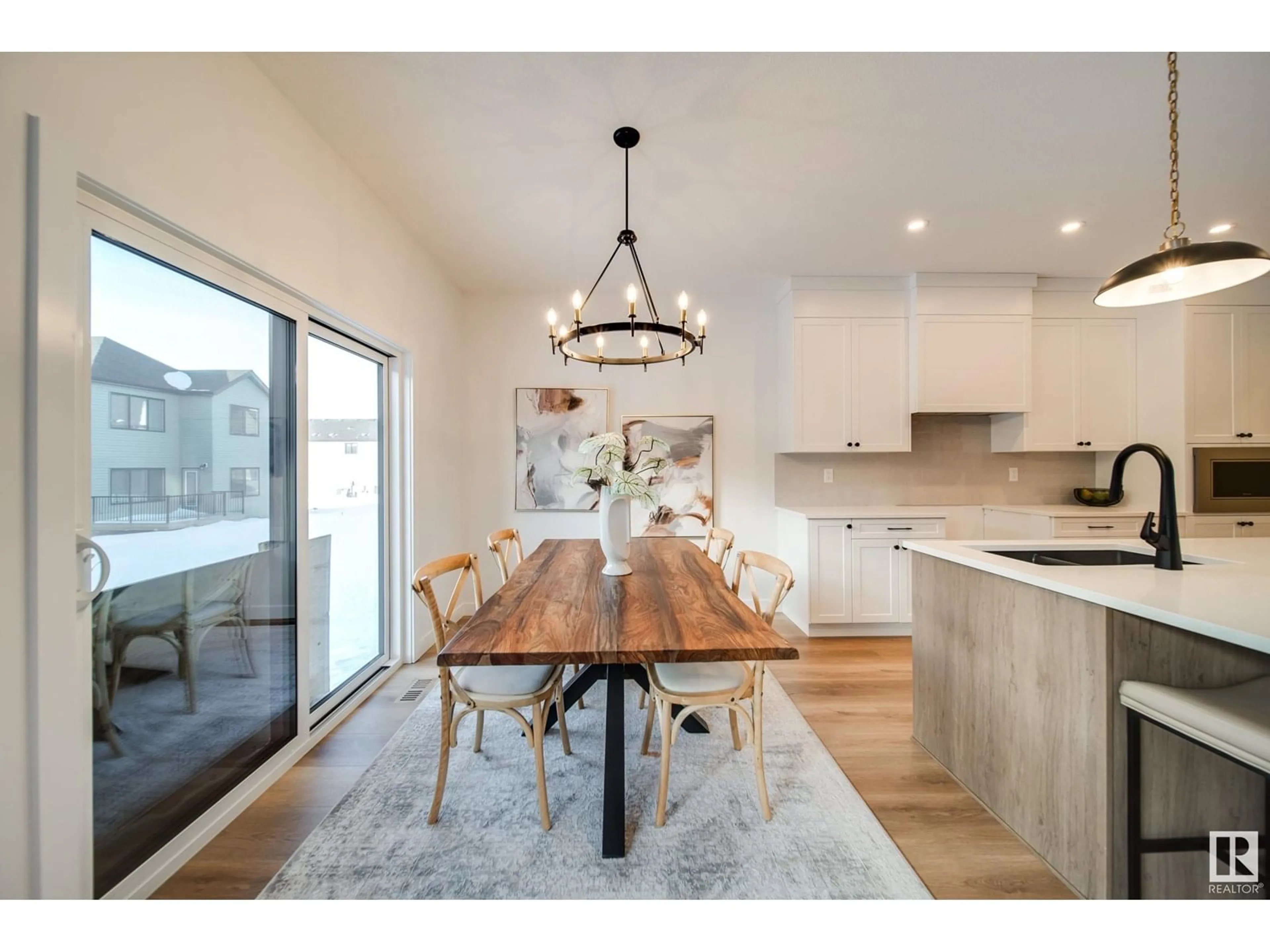 Open concept kitchen, wood/laminate floor for 2 CLOUTIER CL, St. Albert Alberta T8T2C9