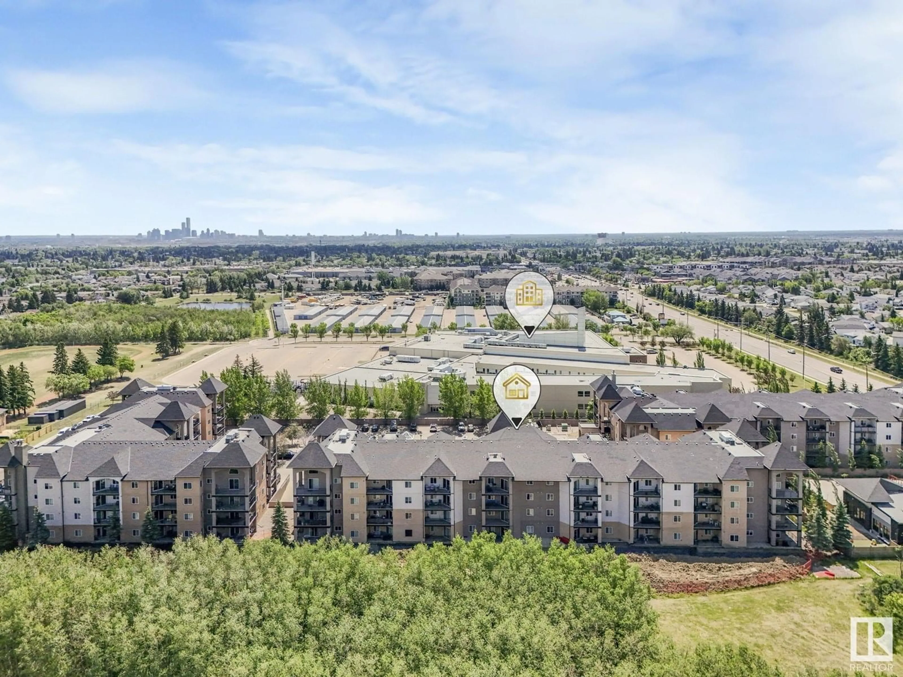 A pic from outside/outdoor area/front of a property/back of a property/a pic from drone, city buildings view from balcony for #104 - 14608 125 ST, Edmonton Alberta T5X0B5